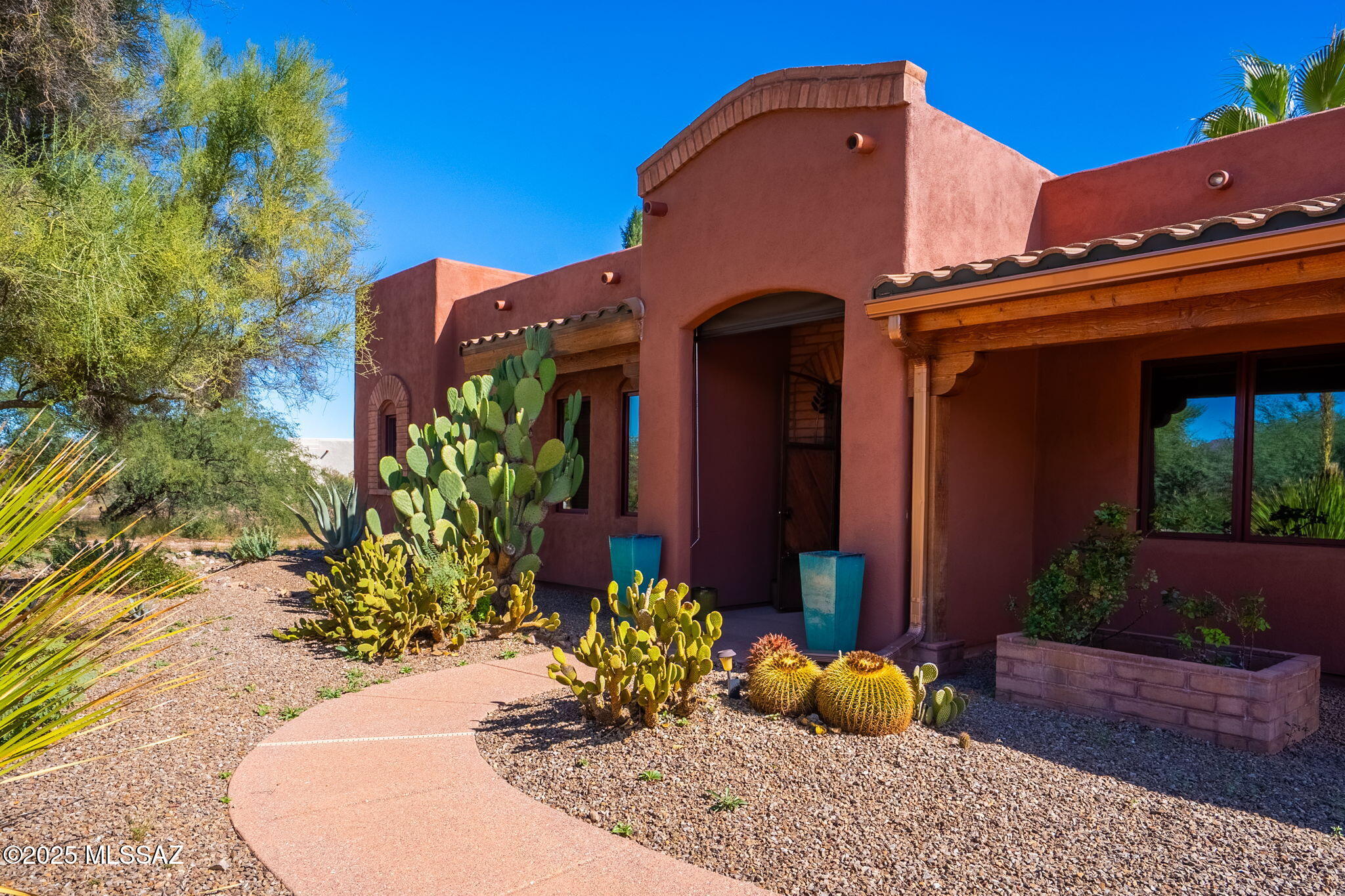 Custom Tubac Golf Resort Home on the 5th Fairway of the Anza Golf Course! You'll enjoy stunning sunrise and Santa Rita mountain views from the great room, kitchen, dining room, and back patio. The large primary suite opens to the sun room and heated, covered pool and also features an  ensuite bath and walk-in closet. The office and oversized laundry room adjoin the primary suite. The second bedroom has a full ensuite bath with a den/office that opens to the courtyard for private entry. Your guests will also enjoy the separate casita off the front courtyard. 3 BD, 3.5 BA, 3,059 sq.ft. A must see!