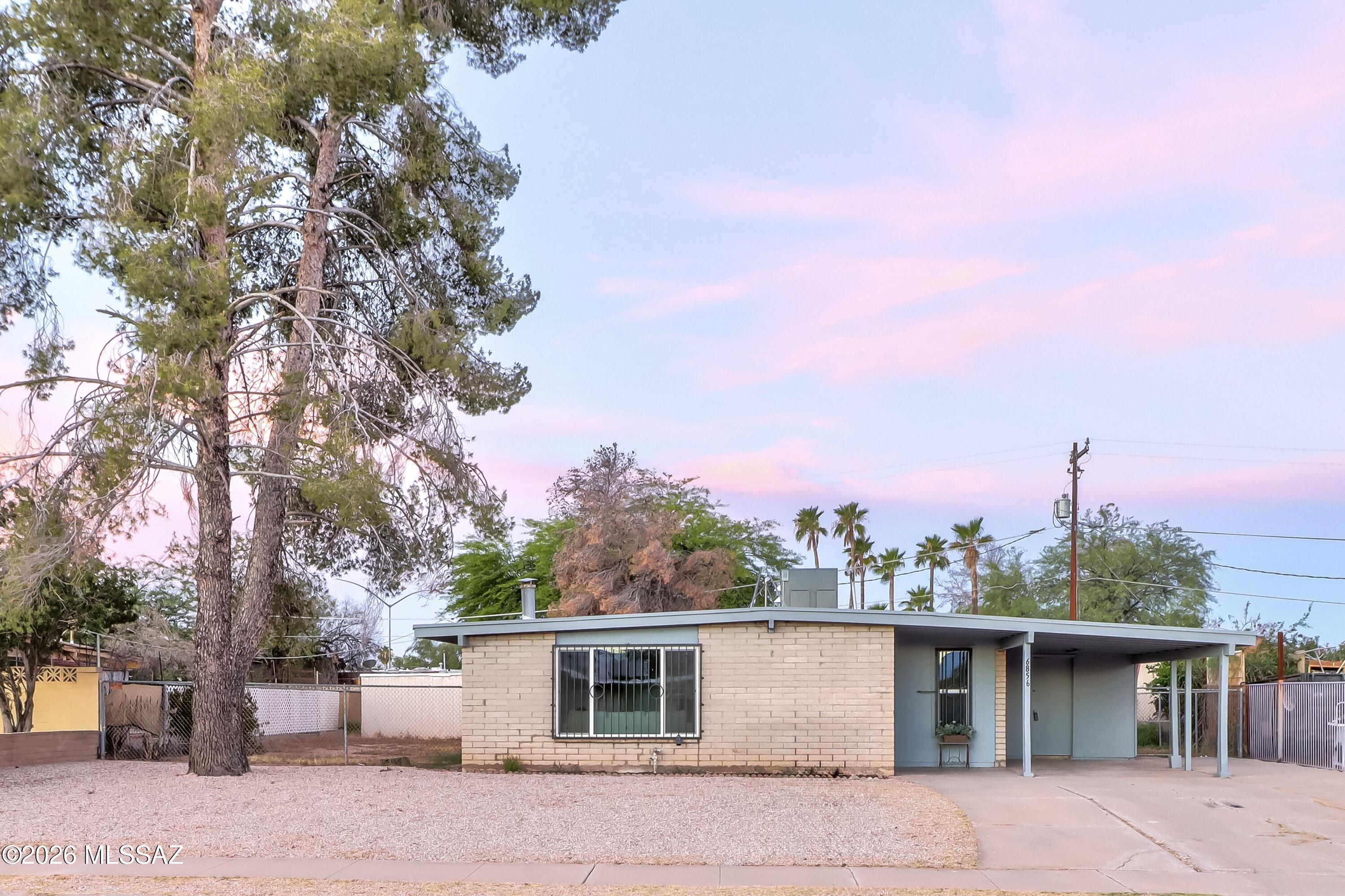 Welcome Home to where affordability meets style and comfort. This remodeled 4 bedroom, 2 bath home features new paint, flooring, kitchen cabinets, counters, plumbing fixtures, hardware, tiled bathroom shower enclosures, vanities, toilets, light fixtures, HvAC system, and paid of solar panels for even more savings. The property is also conveniently located near multiple shopping centers, restaurants, public transportation, parks, DMAFB and more. Don't wait to make home ownership a reality--this home makes dreams possible! Come. See. Stay!
