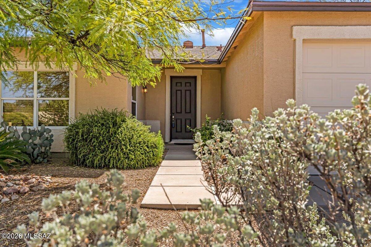 Desert Views, Privacy & Adventure Await in Tucson Mountain Sanctuary!
Discover an exceptional opportunity to own this beautifully maintained 4-bedroom, 2-bath home in the highly desirable Tucson Mountain Sanctuary. With 2,045 sq. ft. of thoughtfully designed living space, this lightly lived-in second home combines comfort, privacy, and breathtaking desert surroundings.
Step inside and you'll find an open-concept floor plan perfect for entertaining and everyday living. The spacious kitchen features stainless steel appliances, abundant counter space, and seamless connectivity to the living and dining areas. Recent updates include a new roof and fresh exterior paint, offering added value and peace of mind.
The real showstopper awaits outdoors. Enjoy stunning sunrise views and breathtaking vistas of Cat Mountain from your backyard. The large patio overlooks natural green space with no rear neighbors, creating a private desert retreat where you can relax, entertain, and watch local wildlife pass by.
Outdoor enthusiasts will love being just minutes from world-class hiking and mountain biking trails, Saguaro National Park West, Gates Pass, the Arizona-Sonora Desert Museum, Old Tucson, and the Tucson Trap & Skeet Club. Spend evenings enjoying spectacular sunsets and incredible stargazing under Arizona's expansive desert skies.