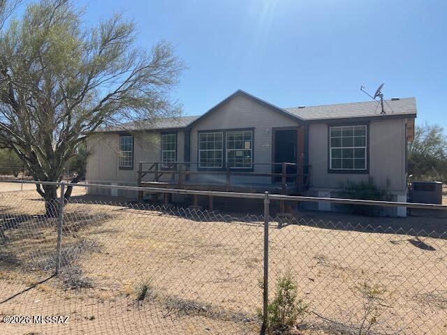 3 bedroom, 2 bath affixed 2001 manufactured home on 1 acre.  Great location near schools, shopping, and I-10 access.  Just a short distance to the paved road from homesite.  Split floorplan with large kitchen and eat in area.  Laundry room, covered porch and shed for storage in backyard.  Needs some TLC but great value.  Take a look.