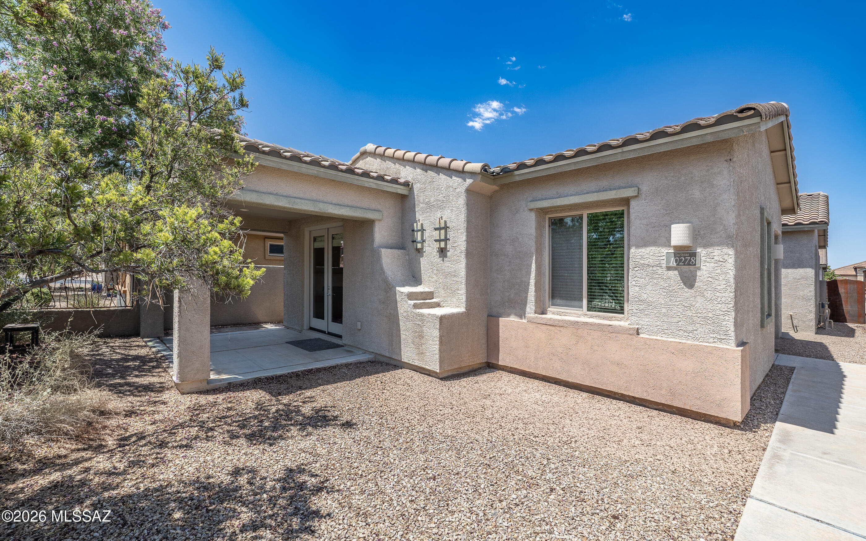 Immaculate Patio Home in Del Webb at Rancho Del Lago, a 55+ Active Adult Community, great location with paid SOLAR, very large great room & family dining area, relax on the covered patio, enclosed yard with view fence, great for your fur babies, spacious kitchen with island, primary suite with shower & walk in closet, guest room & bath, 2 car garage, water softener & reverse osmosis. This is a MUST SEE before it's SOLD.