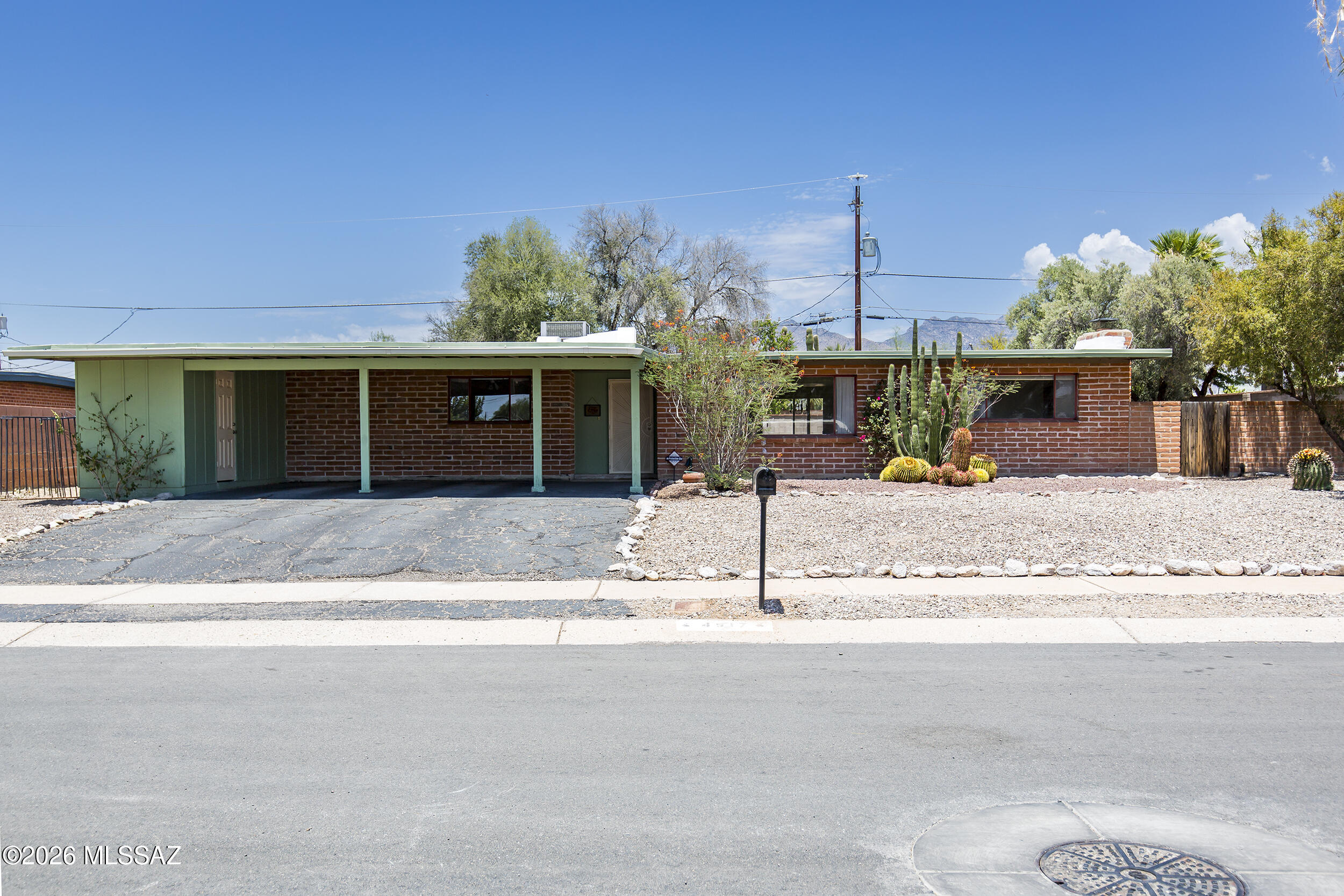 Discover the potential of this classic burnt adobe Mid-Century charmer nestled on a cul-de-sac in the sought-after Glenn Heights with NO HOA! Whether you're looking to update it to reflect your own style or appreciate its timeless character, this home offers a great opportunity. Boasting 1,833 Sqft is a spacious 4-bedroom, 2-bath home on a generous lot with a north-facing backyard, perfect for relaxing, or creating your own outdoor oasis. A newly recoated roof w/warranty provides added peace of mind. Located in one of Tucson's most convenient central neighborhoods with easy access to TMC, shopping, restaurants, parks, river walk, entrainment, and schools. Don't miss the opportunity to make this Glenn Heights gem your very own - schedule your private showing today!