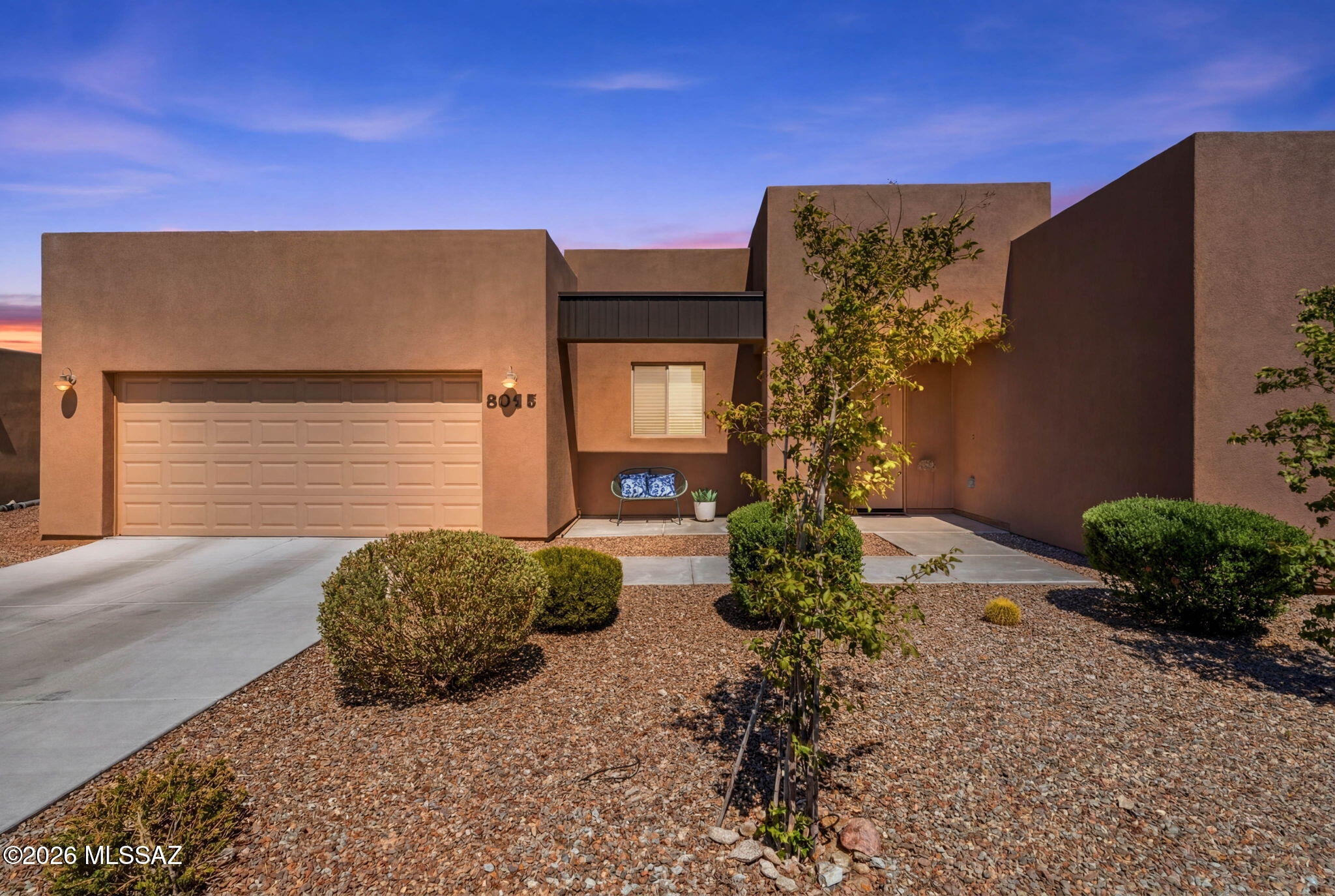 Built in 2022, this 3 bedroom residence rests on a generous lot with wide-open mountain vistas and no homes behind for added privacy. Located within the vibrant Academy Village, where neighbors connect through art, pottery, game nights, and a top-tier fitness center, this nearly new home is ready for your personal style to shine. The upgraded kitchen opens seamlessly to a wall of sliding glass doors, creating a perfect stage for indoor-outdoor gatherings framed by the Rincons and surrounding desert landscape. Step out to the extended covered patio, additional front entry hardscape, and a backyard with room to design the pool or outdoor kitchen you've always imagined. Inside, neutral tones set a calm backdrop for any décor. Experience the best of modern construction without the wait, paired with the lifestyle of an engaged, and state of the art welcoming community.