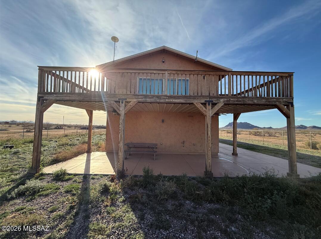 Escape to this quiet, spacious Home surrounded by nature -- it's the kind of place you won't want to miss. Custom RV Port Home has Everything you need to enjoy Your Private Sanctuary on 13 Acres with Stunning views of the  Sawtooth Mountains. 
Home has, downstairs bedroom and bathroom, Covered Porch, Upstairs master suite &  Large Den leading to a full length deck. Home also has  attached garage and covered RV Area.  Propane stove and owned solar. Most furnishing are avaialbe including, furniture, dishes, appliances, lamps, television, etc. 
Relax and watch the skydivers or head out to nearby trails for hiking or riding. Privacy, space and a true rural desert feel.
No HOA! Enjoy quiet country living close to the I-10 halfway between Phoenix & Tucson. 
Buyer to verify all facts and figu