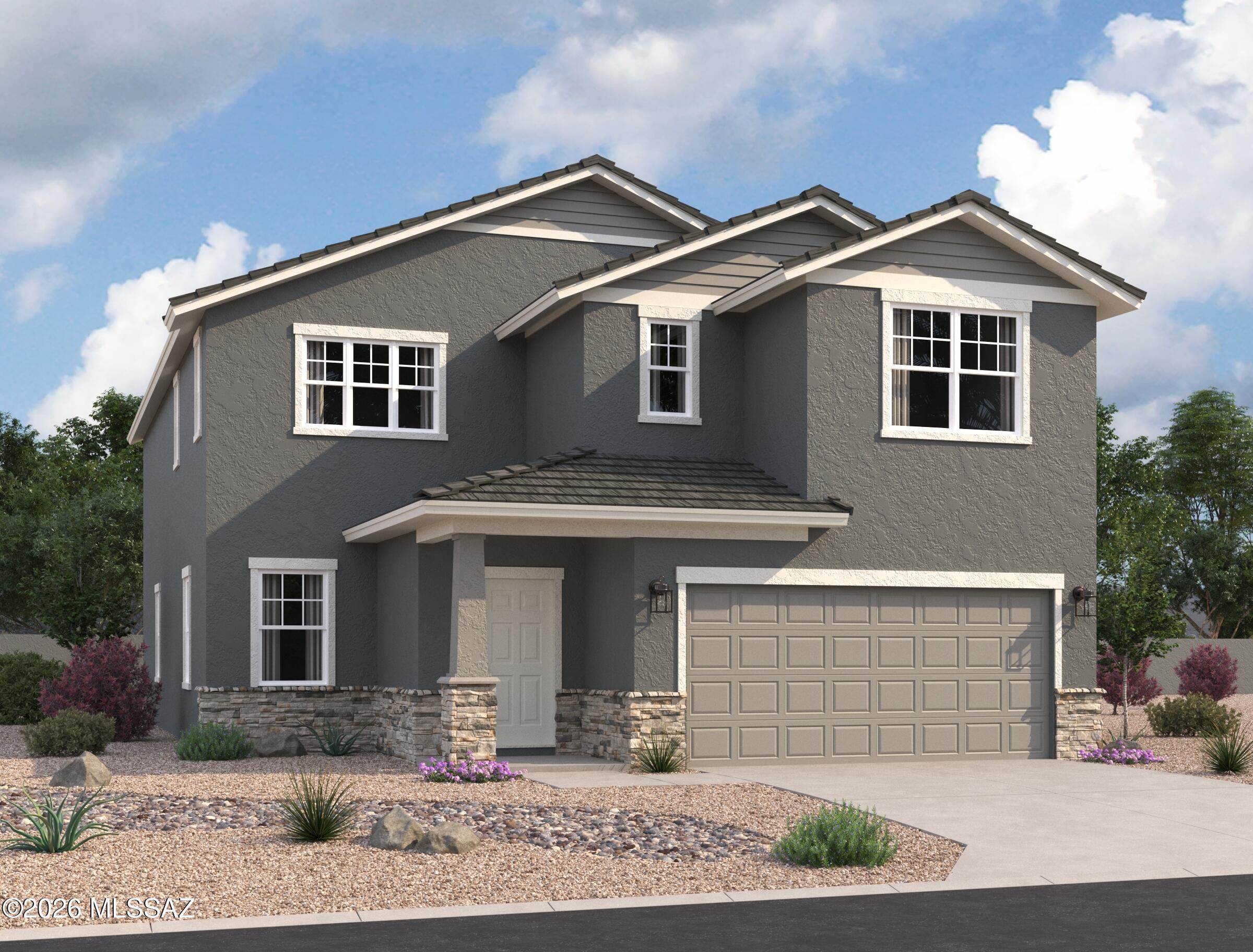 This gorgeous 2-story home sits right across from the park area with great views and beautiful sunsets!  5th Bedroom and 4th Bath are downstairs!  Large loft area upstairs and plenty of room for the entire family.  Beautiful, brand-new homes featuring thoughtfully designed floorplans in the scenic Tucson community of Star Valley! Conveniently located with easy access to I-19 and major Tucson destinations, this community offers the perfect balance of comfort, convenience, and outdoor living. Homes showcase desirable upgrades including 9' ceilings, white shaker cabinets, Shaw 17'' x 17'' tile flooring, and granite kitchen countertops. Each home comes move-in ready with stainless steel kitchen appliances, including a refrigerator, washer, and dryer. Energy-efficient features include Low-E dua pane windows and a Wi-Fi programmable thermostat to help maximize comfort and savings. Exterior highlights include front yard desert landscaping with irrigation, covered patios, and spacious backyards designed for enjoying Tucson's beautiful sunsets. Residents enjoy community amenities including large park with soccer fields; walking paths and natural trails; children's play area; basketball courts; tennis courts; pickleball courts; natural-area dog park and incredible mountain views everywhere! This welcoming community offers the perfect combination of modern living and the natural beauty of the Tucson desert.