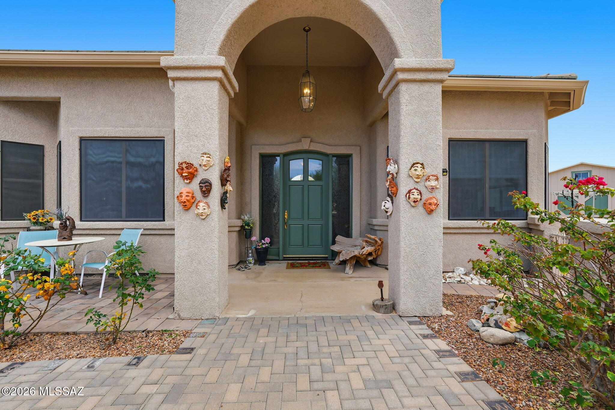 Welcome to a beautiful custom home in a quiet cul-de-sac with no GVR & a very low HOA!! A serene and peaceful desert setting that is one of the best that Sahuarita offers. I think you're going to love this house! Let's start with an expansive lot that's over 1.3 acres. It has a LARGE backyard that has been paved, is covered, has an outside wet bar, and has been completed with a removable fence that separates the LARGE side yard that is ready for your imagination. You've already got 220v wiring and gas hookups out back! Not to mention very easy care, with drip systems throughout all yards so you don't have to stress. Two HVAC units have been recently replaced, one in 2023 and the other in 2025. The home features a grand gourmet kitchen with a 5 burner stove, island, a breakfast bar, and plenty of counter space and cabinets to cook some epic meals. The primary bedroom and bath are HUGE, with dual closets and opposing vanities. Jetted tubs in both full baths will allow you to unwind in the best way. There are a multitude of fruit trees on the property, including two lemon, a peach, a nectarine, a pomelo, and an orange tree. Other trees and easy care make this an absolutely beautiful desert landscape, with your property line extending far past the walls providing a nice buffer between your friendly neighbors. A 3-car garage gives you plenty of space with extended areas for storage, work spaces, and creative opportunities to make the home perfect for you. A courtyard in the front with natural grass allows you to take in yet another special setting of easy peaceful living. The front drive is landscaped with decorative rock that allows for a ton of parking so feel free to invite your neighbors and friends, play some great music, and entertain your hearts out. Peaceful, unique, and a vast playground to enjoy the natural beauty of Southern AZ, this home is going to wow you. Schedule a showing or secure your own private tour before this is gone. I truly think you'll see the love and passion that the owners have given and gone on to enjoy in this home.