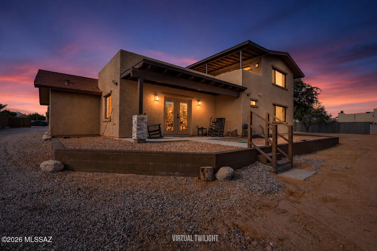 Where the Wild West meets city slicker living! This one-of-a-kind Tucson property offers room to roam and a Western-inspired setting unlike anything else on the market. Featuring five unique outbuildings. This property feels like your own private frontier town. 
The interior has been completely remodeled and has it's very own private space for an extended stay, or investment opportunity! Enjoy stunning desert views, wide-open spaces, and endless possibilities for entertaining, hobbies, events, or simply embracing the Arizona lifestyle. All the charm of country living with convenient access to Tucson's shopping, dining, and everyday amenities. A rare opportunity to own a property that's as memorable as it is versatile.