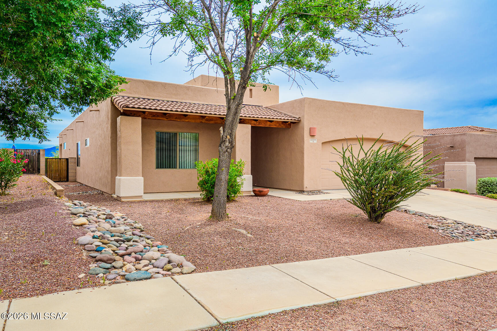 This is the one you have been waiting for!  Desirable HIGH PLAINS RANCH, Home backs up to the 5th Fairway of the RANCHO DEL LAGO GOLF COURSE!  Vail School district!  The exceptionally maintained 1877 SF home features 3 beds and 2 baths! Great Room concept!  Split Floorplan for extra privacy! BRAND NEW CARPET!  Interior Freshly painted!   Large kitchen with large breakfast bar is perfect for entertaining!  Gas Fireplace in great room!  Primary bedroom features large walk-in closet and primary bath features dual sinks and shower/tub combo!  South facing low care rear yard with beautiful sunrise views and also views of the Rancho Del Lago Valley, Rincon and Santa Rita Mountains!  No rear neighbors!  Tandem 3 car garage with built in storage closet!