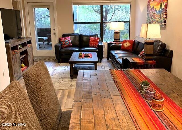 Charming FURNISHED TURN-KEY condominium located in highly desirable Greens at Ventana Canyon community. Come enjoy resort-style living in this upgraded 2-bed, 2-bath unit with private views of the natural surroundings from the patio covered in travertine tile, and enjoy great mountain views from the kitchen! Inside you'll find travertine tile and luxury vinyl in the main living areas, with cozy carpet in the bedrooms. Bathrooms have been remodeled with travertine tile as well. This FIRST FLOOR easy access unit comes with assigned covered parking just steps from the front door. UPGRADES INCLUDE: New HVAC system, remodeled bathrooms with beautiful master walk-in shower; in the kitchen - cabinets, Corian counter-tops, and stainless-steel appliances. STRONG RENTAL HISTORY, records available.