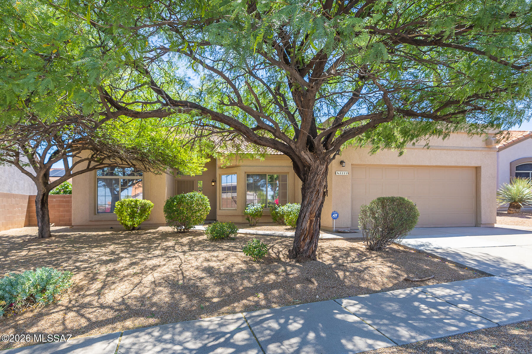 This immaculate and wonderful updated 3-bedroom, 2-bath home is located in a desirable eastside community called Silverado Hills. Spacious open floor plan with vaulted ceilings. Spacious great room with cozy fireplace.  Upgraded kitchen with custom cabinetry with pull-out shelves, granite countertops and newer SS appliances. Breakfast nook with nice views. Beautiful travertine tile floors in most rooms. Plantation shutters. Decorator colors. Private primary bedroom with luxurious bathroom, custom tile and large walk-in-closet. Laundry room. Newer HVAC system 2022. Expansive private walled rear yard with mature landscaping, multi-trunk Camphor tree, citrus trees, covered patio, upgraded irrigation system and mountain views. This home is truly special.