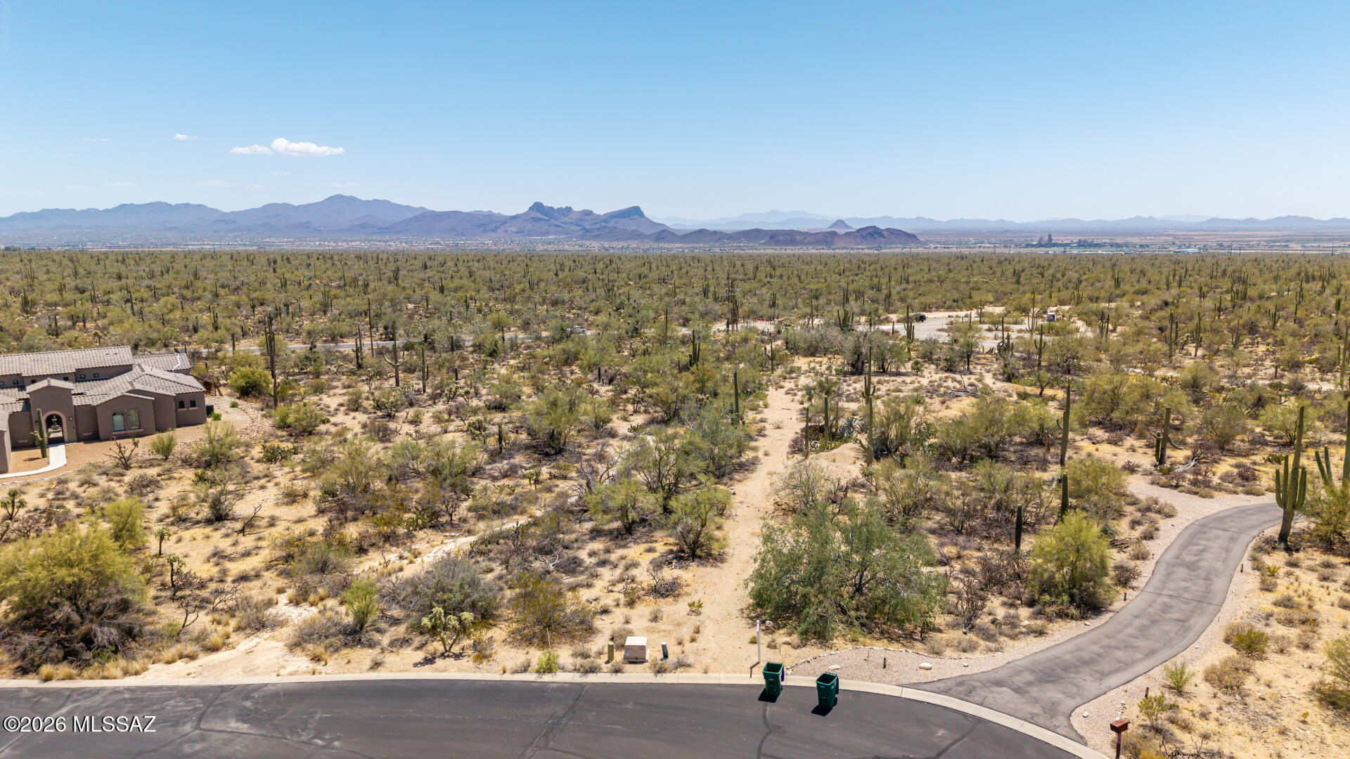 Create the custom home you've always envisioned on this exceptional 2+ acre homesite! Tucked away at the end of a quiet cul-de-sac in the gated Estates at Tortolita Preserve, an exclusive enclave in the highly desirable Dove Mountain area. Surrounded by untouched Sonoran Desert and bordering more than 2,400 acres of protected preserve land, and easy access to the AZ State Trust Land. The relatively flat terrain simplifies the building process, while utilities are already available at the lot (except septic), allowing you to focus on bringing your vision to life. Enjoy unobstructed peaceful sunsets with westward mountain views, and convenient access to hiking and biking trails, golf courses, dining, and everyday amenities. Optional concept building plans (with RV garage) included with the sale. Plenty of land for separate casita as well. Extra dirt fill is already available on the lot for grading. Recent land improvements include removal of west side power lines for wide open sunset views.