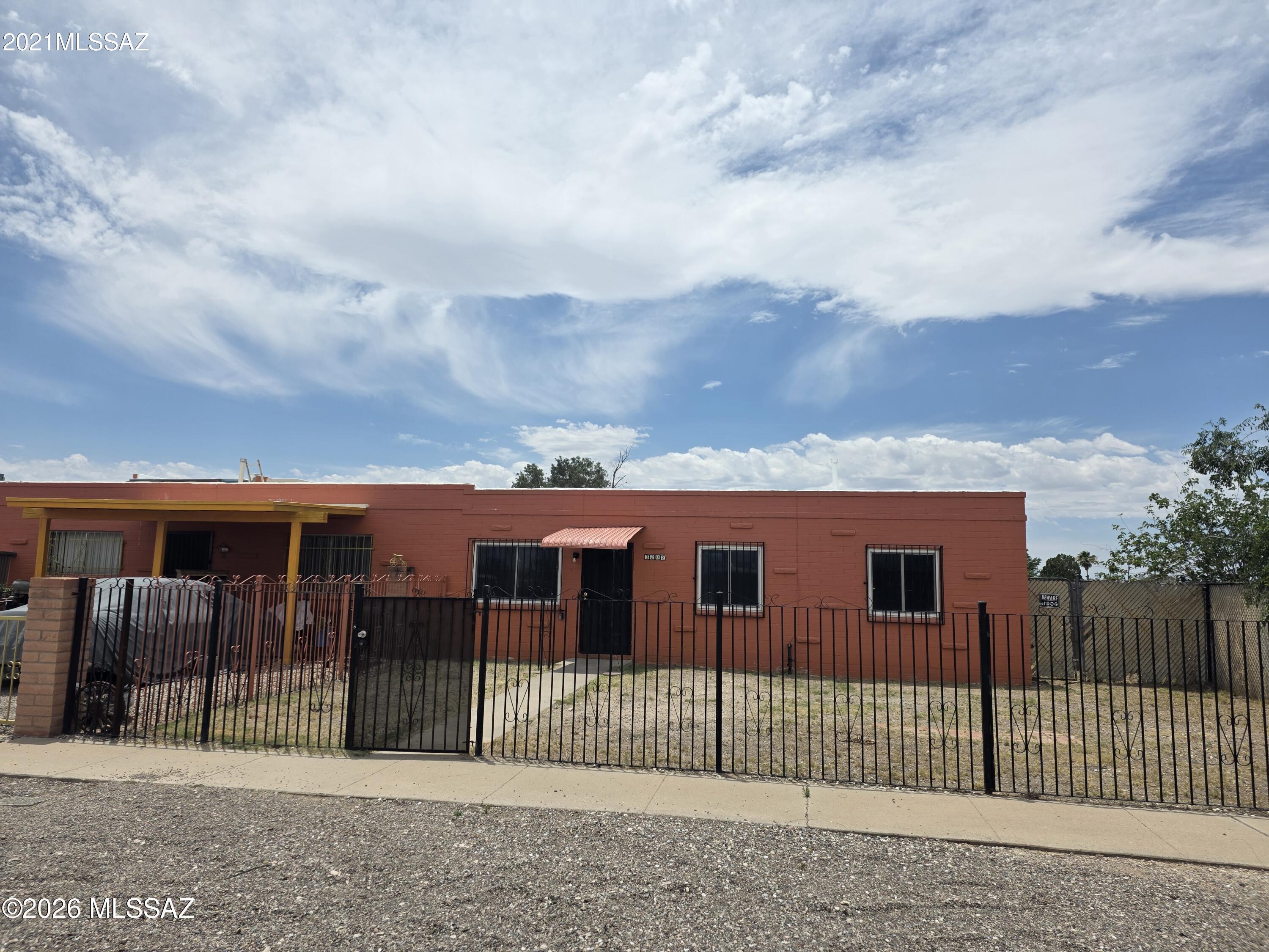 Great Location, Remodeled 3 bedroom 1 bath home with 5100 + sq ft lot. and NO HOA. Home is located just minutes from Costco,  Bass Pro Shops, Walmart, Century Theators and many Restaurants at Tucson Market Place, and Kino Sports Park complex.  Also just 10 minutes from UofA, Downtown Tucson, DMAFB, and the Tucson Internationional Airport.  This Townhome features New kitchen, New upgraded Bathroom, New Appliances, all Ceramic Tile flooring throughout the home, New water heater and Roof Maintenance completed with warranty. Walking distance to Elementary and Middle schools and neighborhood park. Seller is Owner/Agent