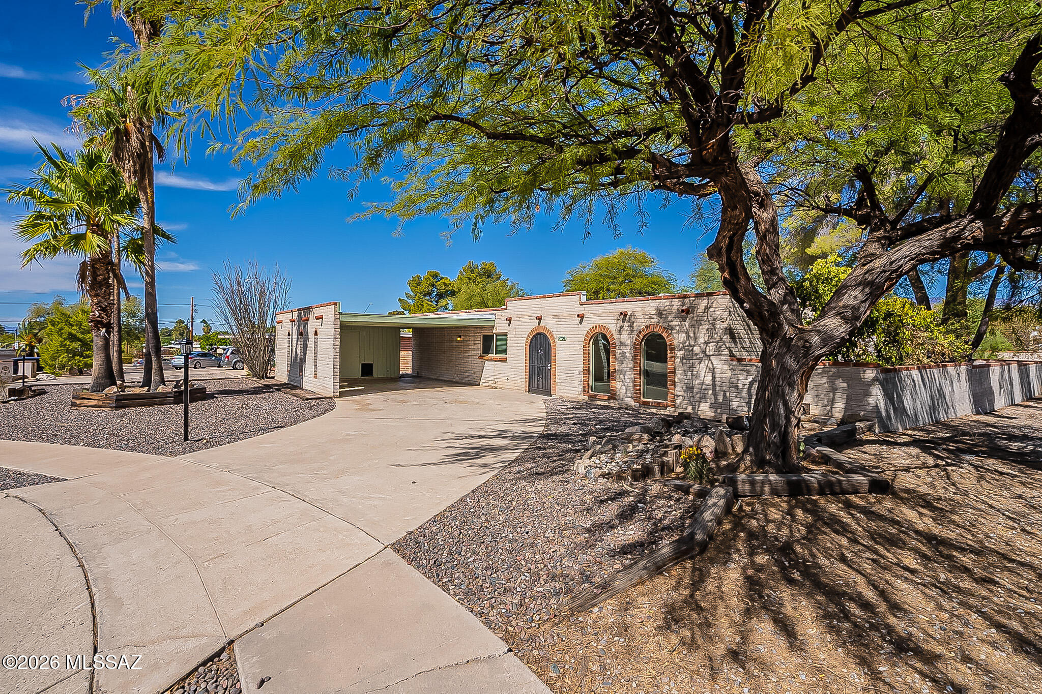 Beautiful, completely remodeled East Side home with a sleek Mid-Century Modern vibe. This 4-bedroom, 2-bathroom residence was fully updated approx beginning of 2021. Features include custom walnut cabinetry, quartz countertops, and seamless stained concrete flooring throughout. Large backyard with mountain views. Conveniently located and move-in ready! Owner Agent.