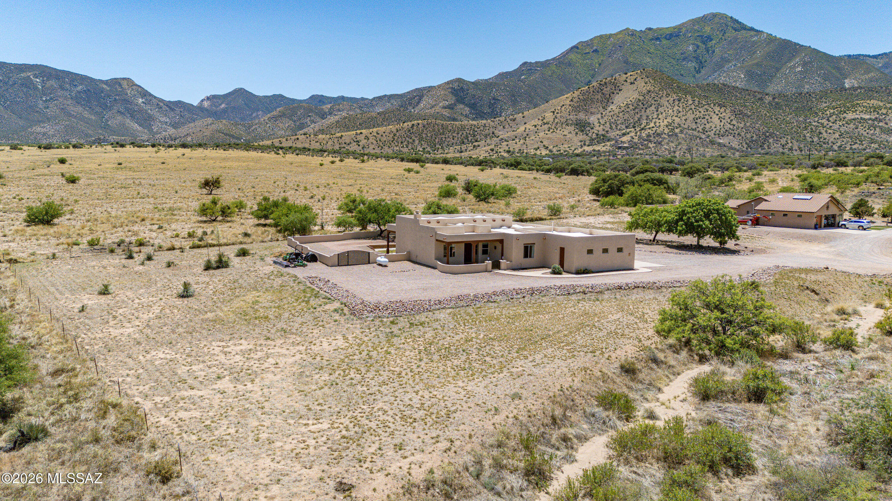 Spacious 4-bedroom, 2-bath home on 2.5 acres with stunning mountain views! This well-maintained property features a gorgeous great room perfect for entertaining, an oversized 3-car garage, and a shared well with just one other property (2-well share). Enjoy peace of mind with brand-new exterior paint and pride of ownership throughout. Plenty of room for animals, toys, RVs, or simply enjoying the open space and beautiful surroundings. A rare combination of comfort, space, and scenic country living!