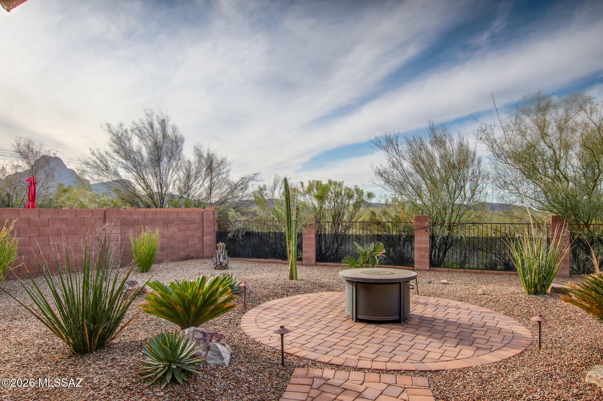 Experience unforgettable Mountain and Sunset Views in this Spacious, Turnkey-Ready Home! Step inside to soaring ceilings, a bright formal living/dining area, and a cozy family room w/ a Fireplace, pre-wired surround sound, and a charming breakfast nook off the kitchen. The Kitchen offers Maple Cabinetry, SS Appliances, Corian countertops. Spacious primary suite w/ a Private-Oversized Balcony perfectly positioned to capture those sweeping views. An upstairs Loft w/ a built-in workstation provides added versatility. Enjoy the peaceful Az desert life on your Full-length covered Patio & View fence, Relax in your low maintenance backyard w/ pavers, fans, & Firepit.  Home comes with Newer AC & Water Softener AND 28 solar panels. The previous owner has not paid a TEP Bill in years--
WELCOME HOME