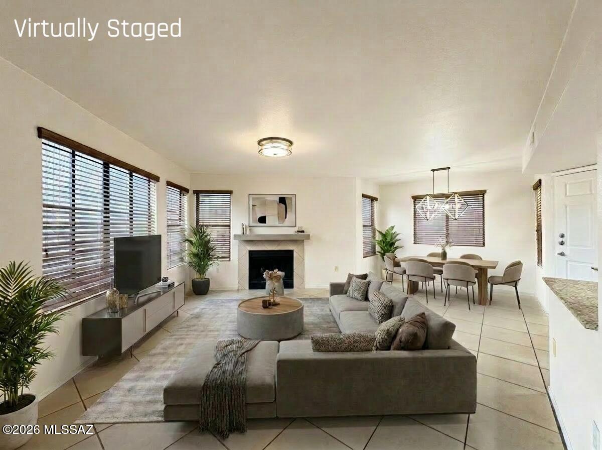 This is the home you've been waiting for! Located in top-rated District #16 school system, enjoy luxury desert living at this floor level condo nestled in the lovely Villas at Sabino Canyon. Walk into the spacious living room, complete with natural light, tile floors and fireplace, perfect for those cool winter nights. Gorgeous kitchen is complete with granite counter tops, cherrywood cabinetry, plus all stainless steel appliances! The gated community offers resort-style facilities including pristine swimming pool, spa and fitness center! Not to mention all that Sabino Canyon has to offer, such as shopping, famous hiking spots and more! Look no further as the beautiful desert landscape surrounds you, and you'll breathe a sigh of relief for finally finding home.