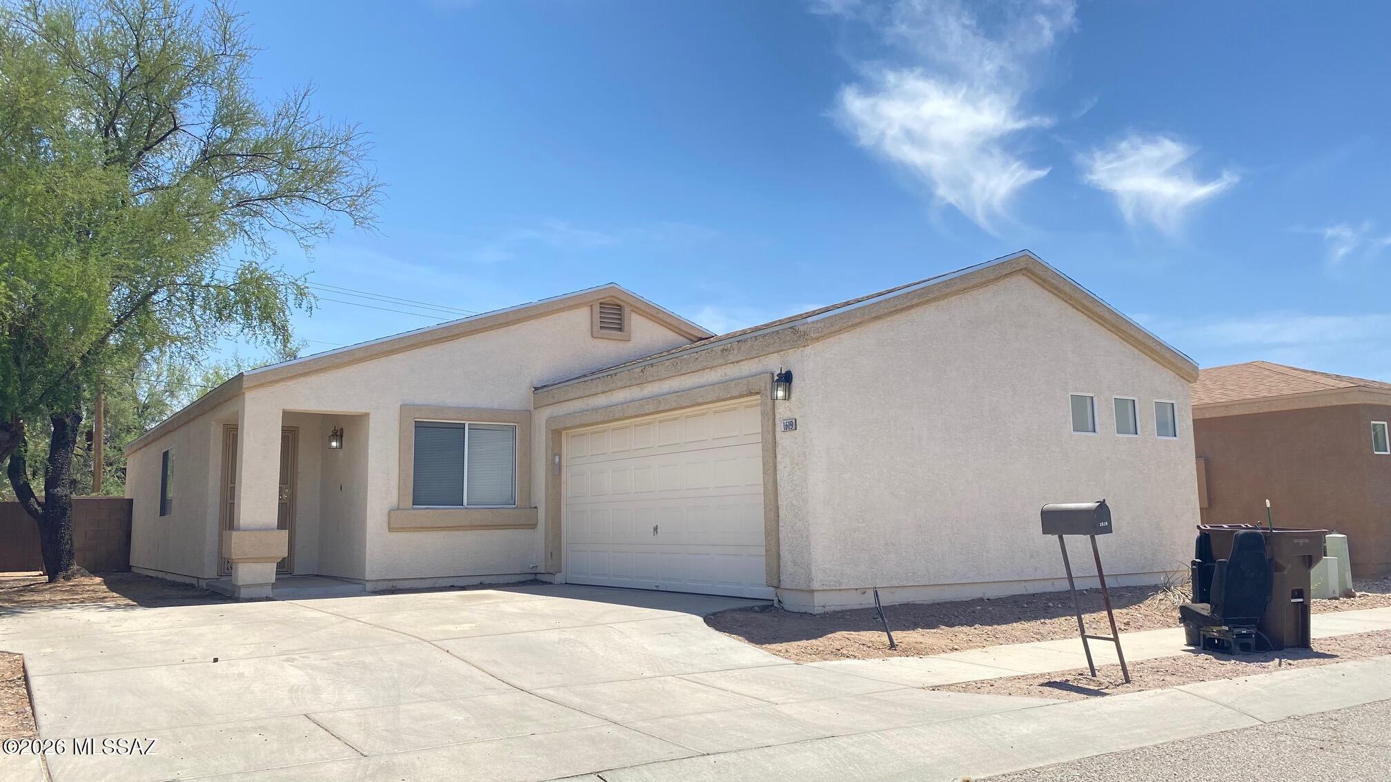 3 bedroom/ 2 bath with vinyl flooring throughout. Covered rear patio and a 2 car garage.