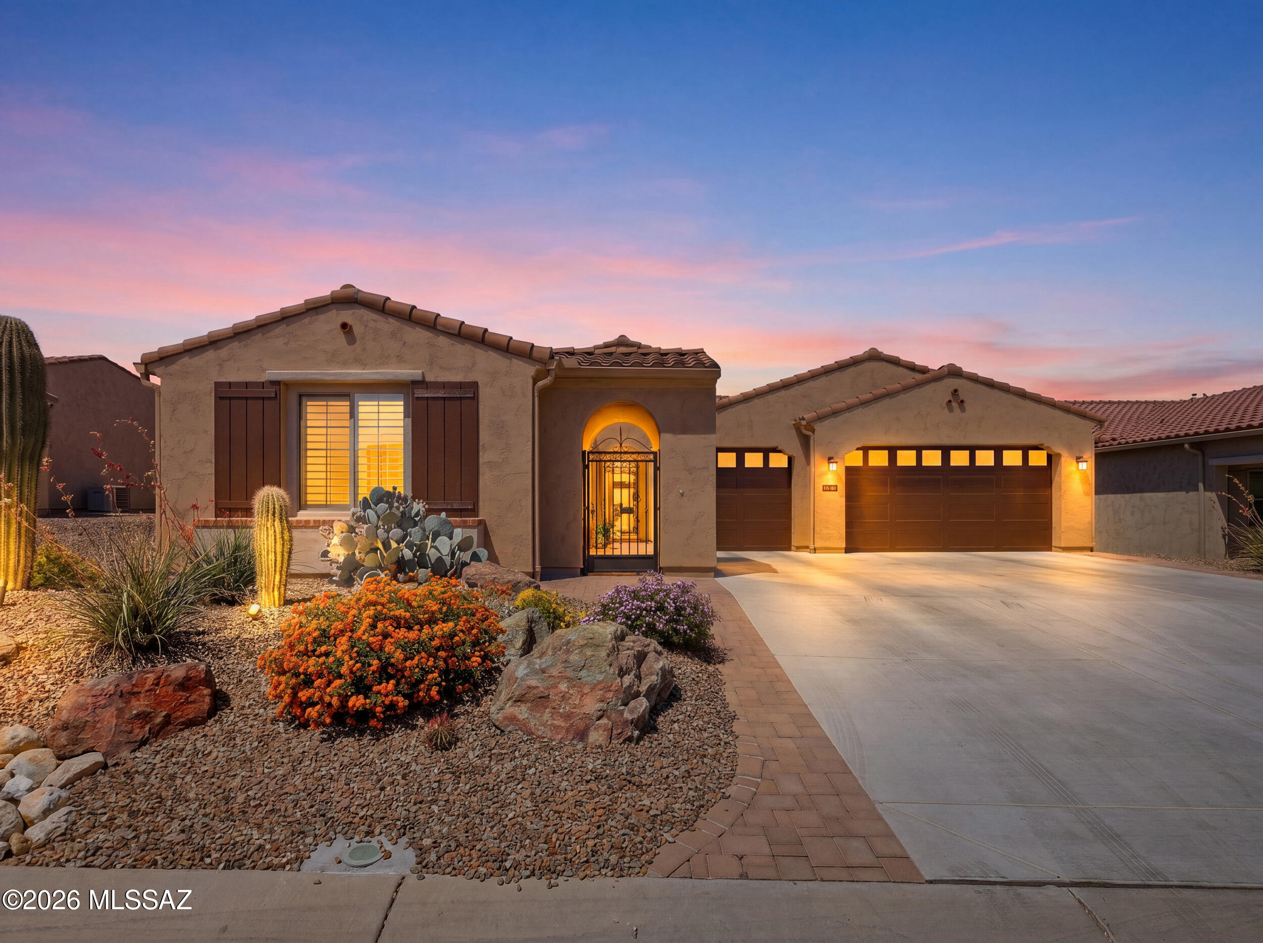 Gorgeous Vienta Model home with casita located in Saddlebrooke Ranch where you can experience resort style living with abundant amenities. When you enter, you immediately notice the bright and airy space, neutral color palette, and beautifully appointed design with versatile spaces such as the den and casita. Gourmet kitchen features gas cooktop, large island, bar seating, pantry and soft close cabinetry. The kitchen is open to the great room making it the perfect gathering place for family and friends. Two bedrooms plus a den are within the main body of the home. A bedroom, full bathroom & kitchenette in the casita. Each bedroom offers its own private en-suite. Outside is a gorgeous yard complete with turf, water features & covered patio with gas fireplace. It's vacation every day here!