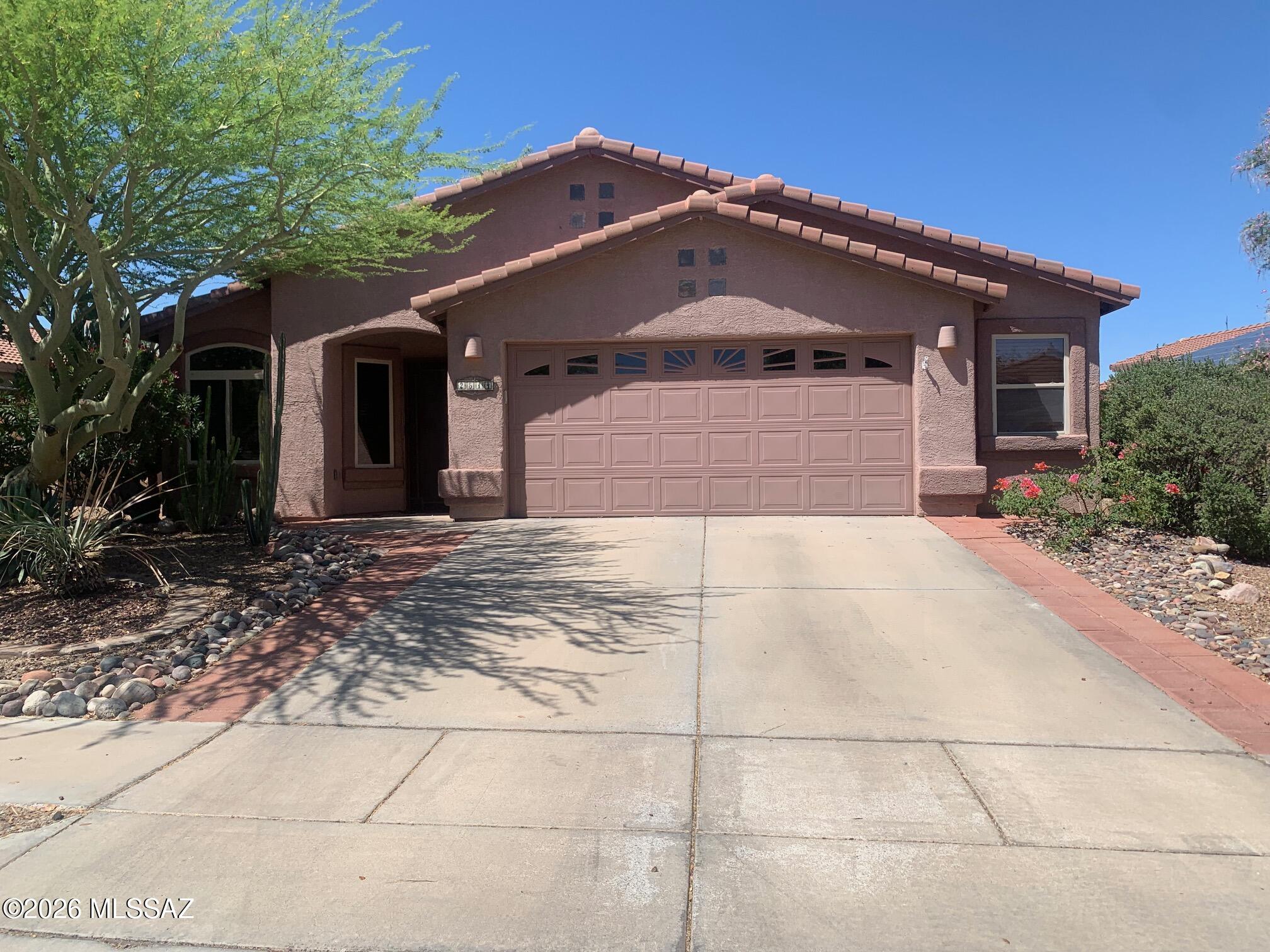 Nestled in the Rancho Vistoso neighborhood of Oro Valley, this exceptional 3-bedroom, 2 bath home offers the perfect blend of luxury, comfort and amazing mountain views. Thoughtfully designed floor plan with spacious living areas and a well-appointed kitchen. Featuring custom cabinetry, ss appliances, granite countertops and a gas stove. Ideal setting for both everyday living and entertaining. Expansive primary suite complete with a walk-in shower, dual sink vanity and generous closet space.Two additional bedrooms offer flexibility for guests, family or a home office. Step outside to your backyard retreat, where a sparkling pool, covered patio and breathtaking views create a resort-like atmosphere.