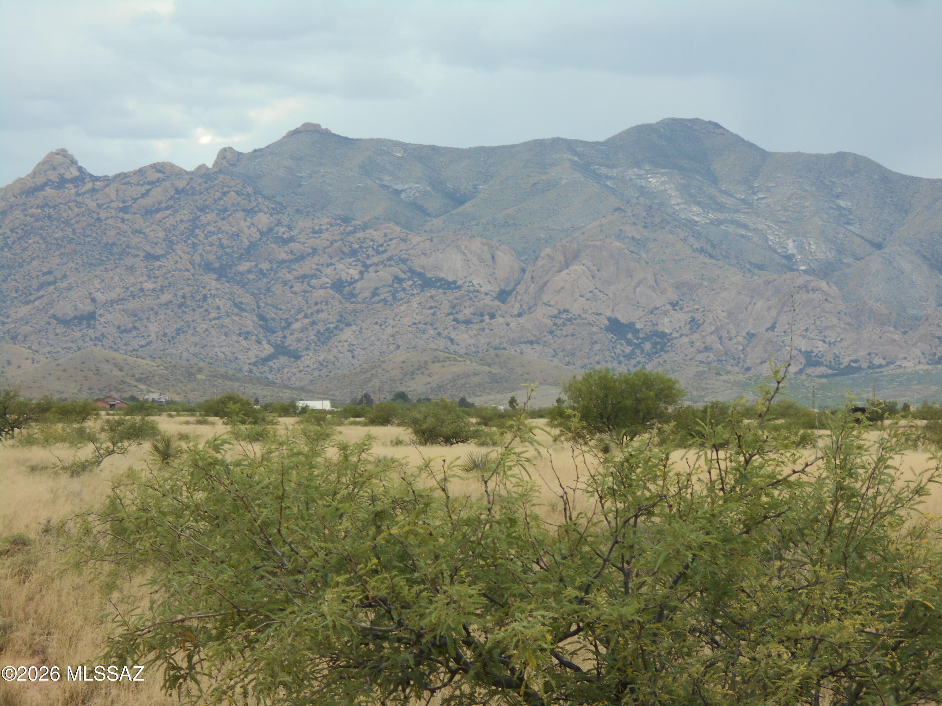 This parcel of just over an acre, west of the charming village of Sunsites, is within an area with beautiful grassland, with magnificent views of the Cochise Stronghold! A truly peaceful setting, with dark night skies for stargazing, abundant wildlife, and teeming with southwest history, it is a beautiful place to call home. Less than 2.5 miles to Sunsites for all the conveniences you need. Just 300' from county maintained Treasure Road. This is a great find, at an affordable price!