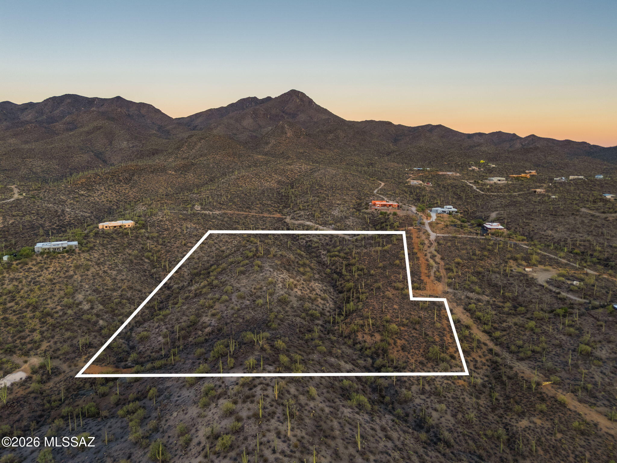 Welcome to one of the most spectacular undeveloped homesites on Tucson's coveted west side. This extraordinary 10+acre Sonoran Desert estate parcel offers a rare opportunity to create a legacy property surrounded by breathtaking natural beauty, just one parcel from Saguaro National Park. Elevated to capture sweeping panoramic views of the Tucson Mountains, sparkling city lights, and unforgettable Arizona sunsets, this remarkable property is blanketed with thousands of majestic saguaro cacti and vibrant native desert vegetation, providing an authentic Arizona landscape unlike any other. Comprised of two contiguous parcels totaling 10.91 acres, this exceptional property offers endless possibilities.  More--> Design and build a private luxury estate, create a secluded family compound, or explore the potential to divide the property into multiple homesites (buyer to verify all zoning, subdivision, and development requirements). All property corners have been clearly marked for added convenience.
One of the property's most valuable and unique features is the inclusion of three fully paid Tucson Water service connections already on-site--an incredible advantage that can save significant time and development costs. Electric service is conveniently available at both the northeast and southeast corners of the property, while paved road access extends nearly to the lot, providing easy year round accessibility. Enjoy the peace and privacy of the Sonoran Desert while remaining just minutes from Downtown Tucson, Interstate 10, shopping, dining, entertainment, and countless outdoor recreation opportunities. World-class hiking, mountain biking, wildlife viewing, and scenic desert trails are all within easy reach, making this an exceptional setting for those seeking both adventure and tranquility.
Horse property by zoning with no HOA, allowing greater flexibility for your vision. A simple annual road and gate maintenance agreement of just $300 helps preserve access and the area's natural appeal. A survey illustrating a potential three-lot split is available for review, offering additional possibilities for future development (buyer to verify).
Large acreage parcels with panoramic mountain and city views, thousands of mature saguaros, paved access, city water already on-site, and future development potential are becoming increasingly rare. This is more than vacant land--it's an opportunity to build an extraordinary lifestyle in one of Tucson's most sought-after desert settings. Don't miss your chance to own a truly remarkable piece of the Sonoran Desert.
See property website for all pictures. 
https://media.hausphotoco.com/sites/rlvkgpzo/unbranded