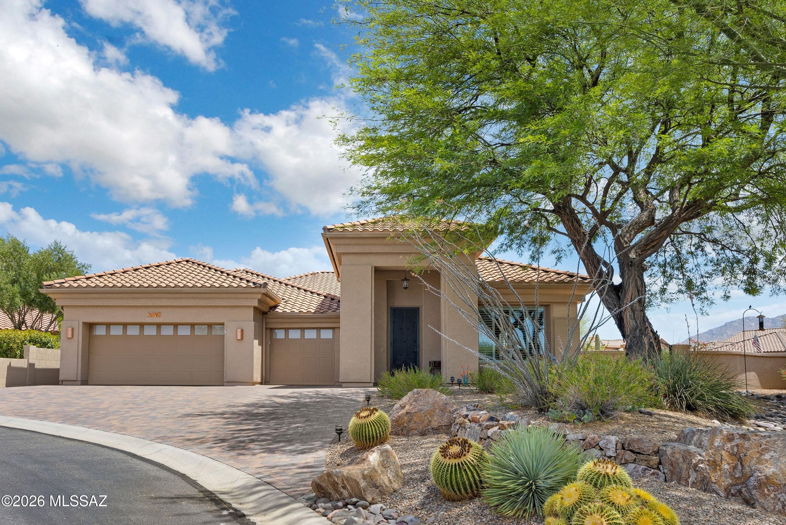 Updated Cheyenne on Quiet Cul-de-Sac with Mountain Views! Paver driveway & walkway lead to front entry. Living Room with Dining Area & Den with built-in office system. Wet bar to entertain. Kitchen features granite counters, stainless appliances, gas cooktop, knotty cherry cabinets, island, R/O, & Family Room with patio slider. Powder room for guests. Owner's Suite ensuite has soaking tub, walk-in shower, & 2 custom-organized walk-in closets. 2 Guest Bedrooms with closets & nearby Guest Bath. No carpeting, plantation shutters, & Aquasana water filtration system. Laundry Room with W/D & cabinets. Extended 3 car garage with 2021 HVACs, utility sink, cabinets, & epoxy flooring. Covered flagstone patio with built-in BBQ, fireplace, fruit trees, lovely landscaping, gated yard, & mountain views!
