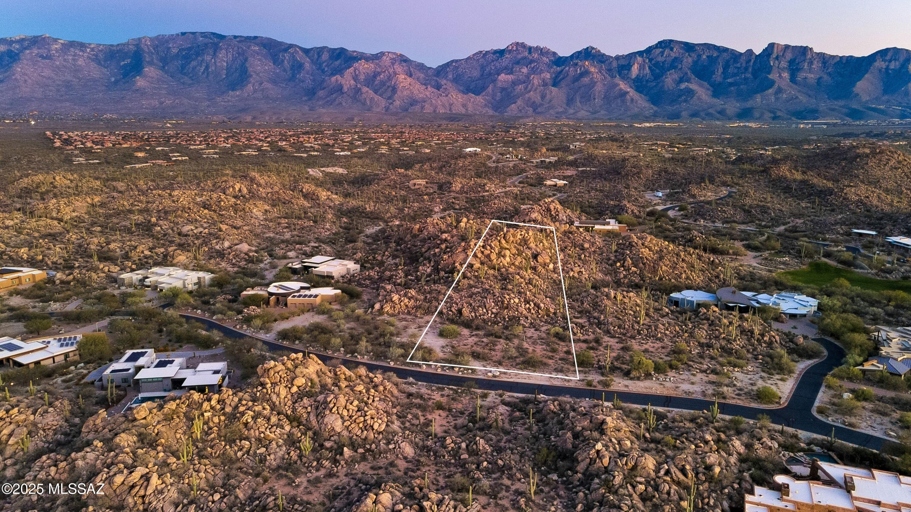 Discover this desirable parcel in Stone Canyon's prestigious Phase 4—an expansive 2.31-acre lot surrounded by dramatic rock outcroppings, towering saguaros, and vibrant Sonoran desert landscape. This property offers a remarkably flat, easy building envelope, allowing for limitless architectural possibilities and significantly reduced site-prep costs.

Set among some of the community's finest custom residences, this homesite offers both privacy and an impressive natural backdrop, making it the ideal canvas for a luxury desert retreat.

Ownership allows access to one of Arizona's top private golf clubs and its exceptional lifestyle amenities, including the Swim, Tennis & Sports Club and the award-winning Stone Canyon Clubhouse. Enjoy year-round sunshine, refined living, and the breathtaking setting that makes Stone Canyon truly unique.