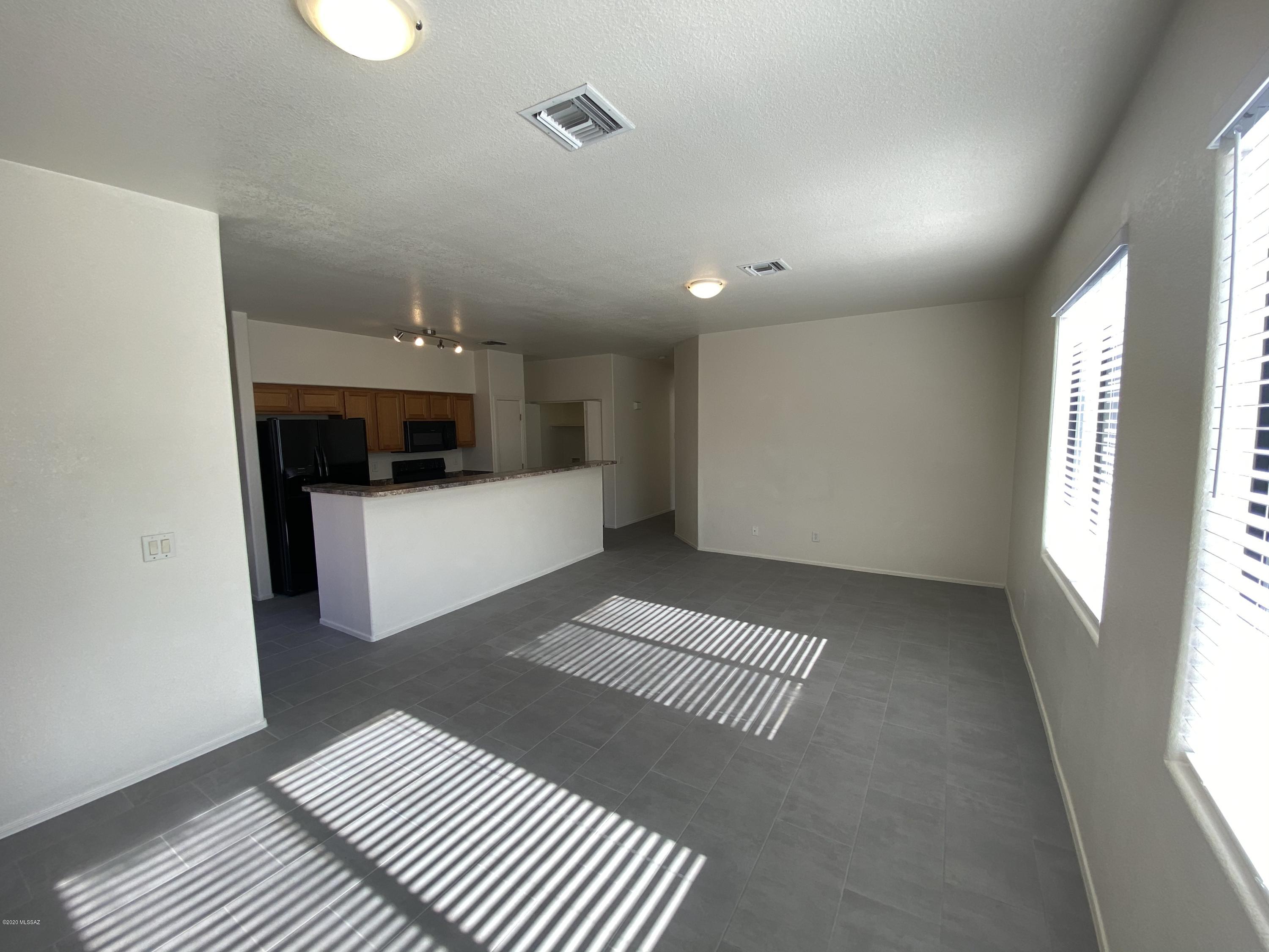 Honey we found our new home. Condominium living is a life style that allows you to live and enjoy life and this home is ready for you. This home features new tile and carpets, new countertops and appliances in the kitchen. Both bathrooms have new vanities and countertops and gorgeous bathtub surrounds. Its an all upstairs home with a two car attached garage.