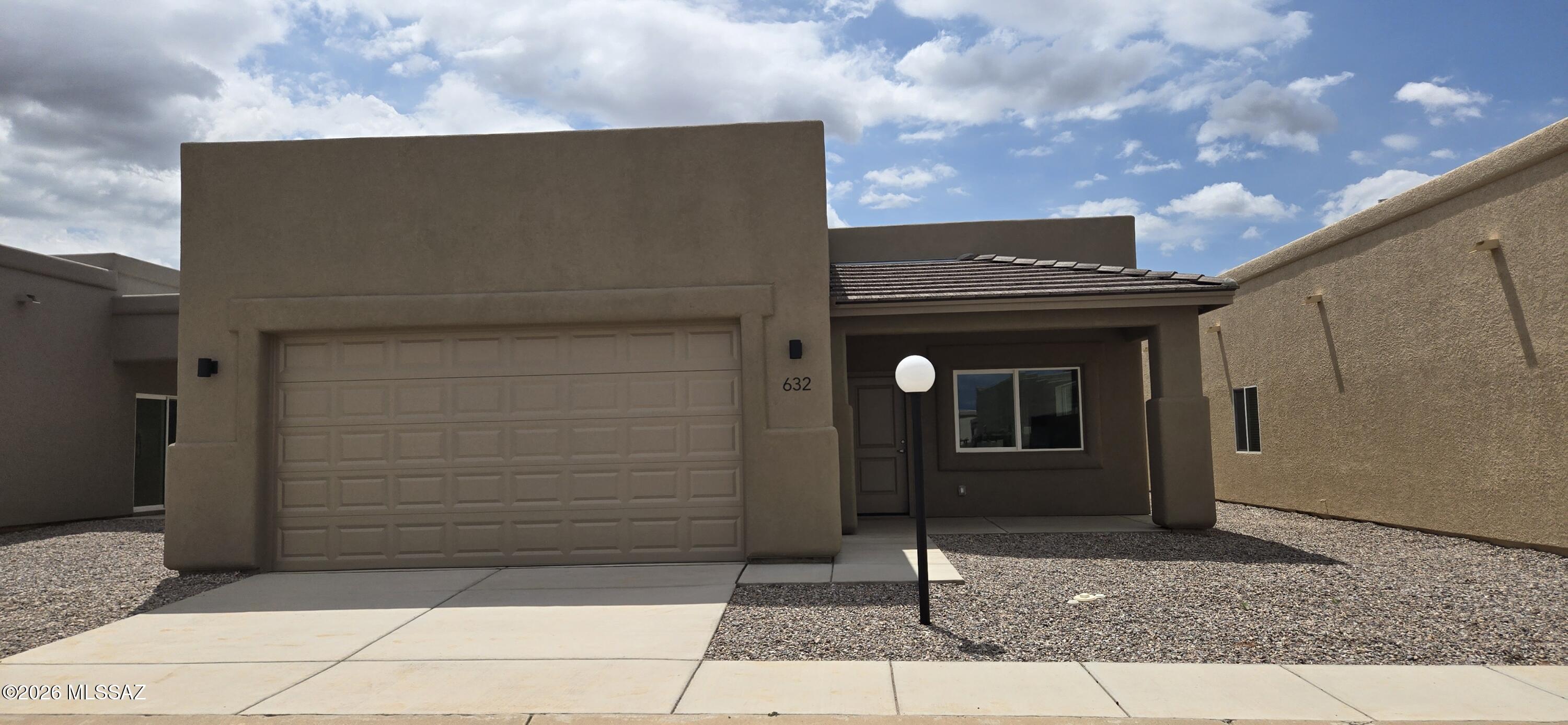 Discover comfortable, low-maintenance living in this beautifully designed Dakota floor plan in Vista View Resort, Sierra Vista's premier 55+ active adult community. This spacious home offers 3 bedrooms, 2 bathrooms, 1,587 sq. ft., and a 2-car garage with an open-concept layout featuring tile flooring throughout, granite countertops, skylights, recessed lighting, ceiling fans, 42-inch hallways, and 36-inch doors. Enjoy a vibrant resort lifestyle with a heated pool and spa, fitness center, pickleball courts, walking paths, clubs, activities, dog parks, and EV charging stations. The monthly Resort Fee includes property taxes, trash service, and access to community amenities.