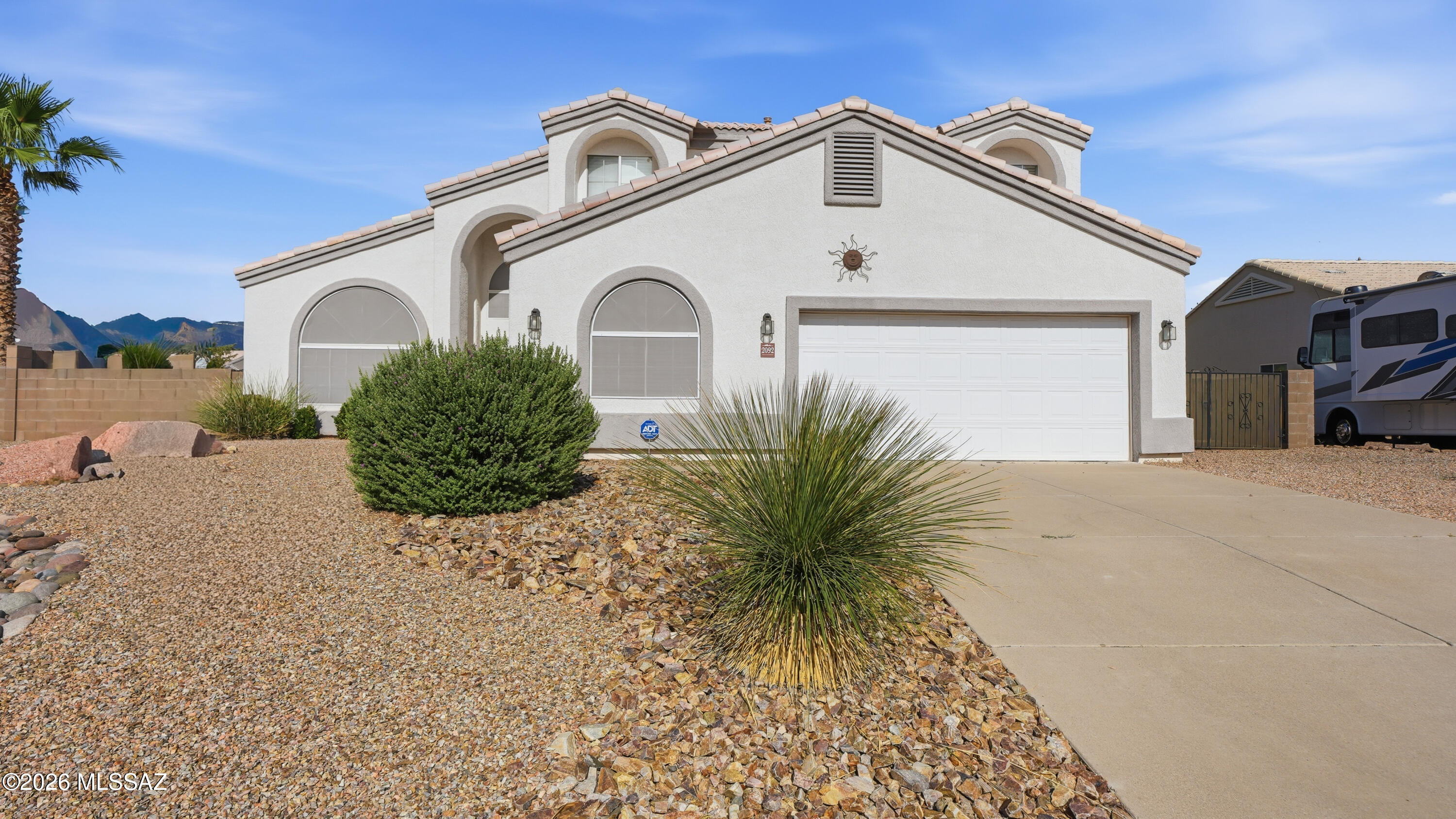 Two story home features 6 bedrooms, 2 living rooms, kitchen with ample cabinetry, pantry cabinet, and all appliances, with 2 downstairs bedrooms and full bathroom. Upstairs holds the main suite with 3 other guest rooms. The backyard is well manicured and includes a cozy enclosed patio. Located in a desirable neighborhood.