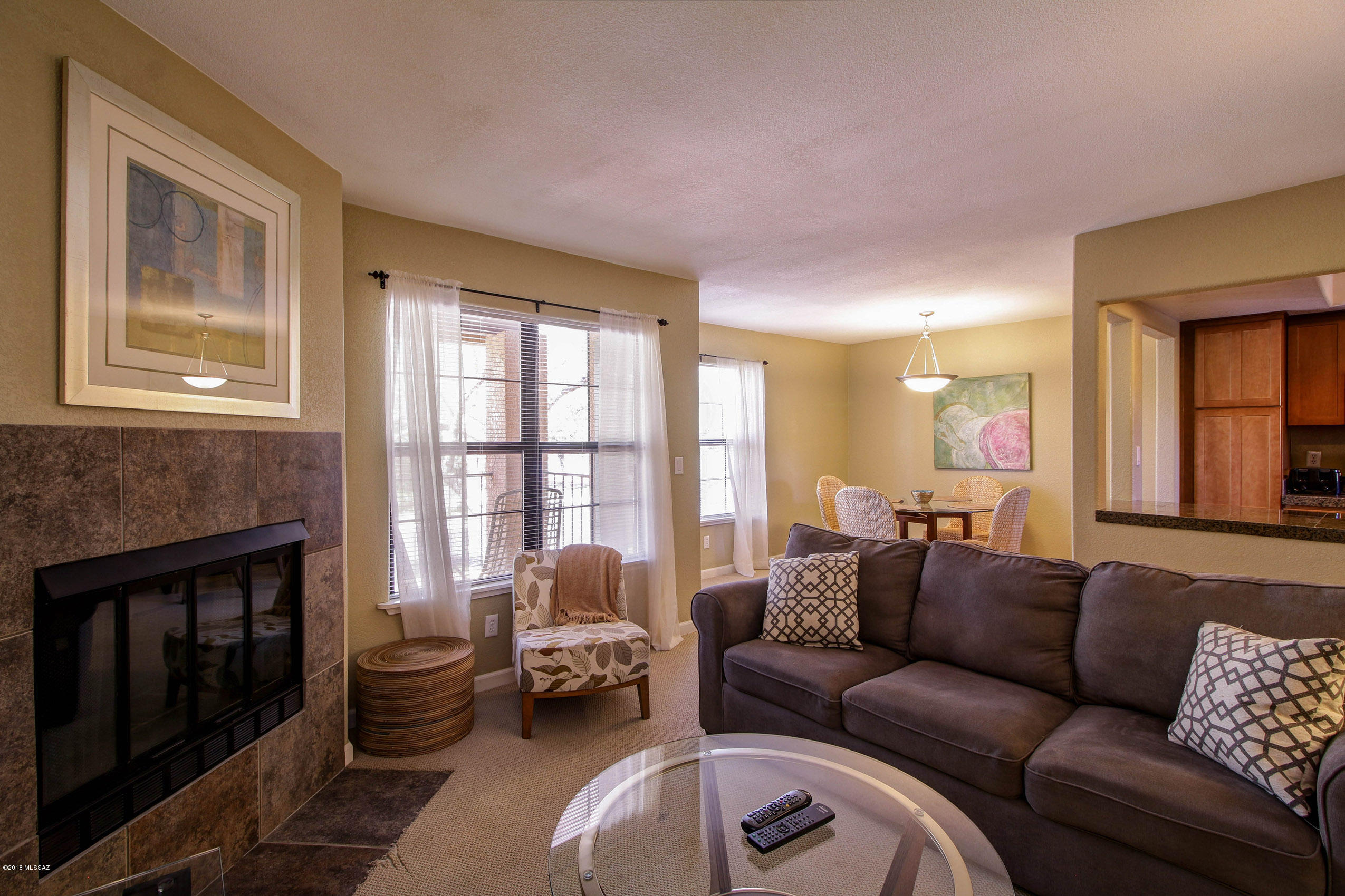 Fully furnished condo in the beautiful Catalina Foothills! Equipped with everything you need - house wares, linens, full-size washer & dryer, cable and Wi-Fi. Relax on your covered patio or take a dip in the sparkling pool! Close to fine dining and shopping, too. Available as a Furnished or Unfurnished unit.
