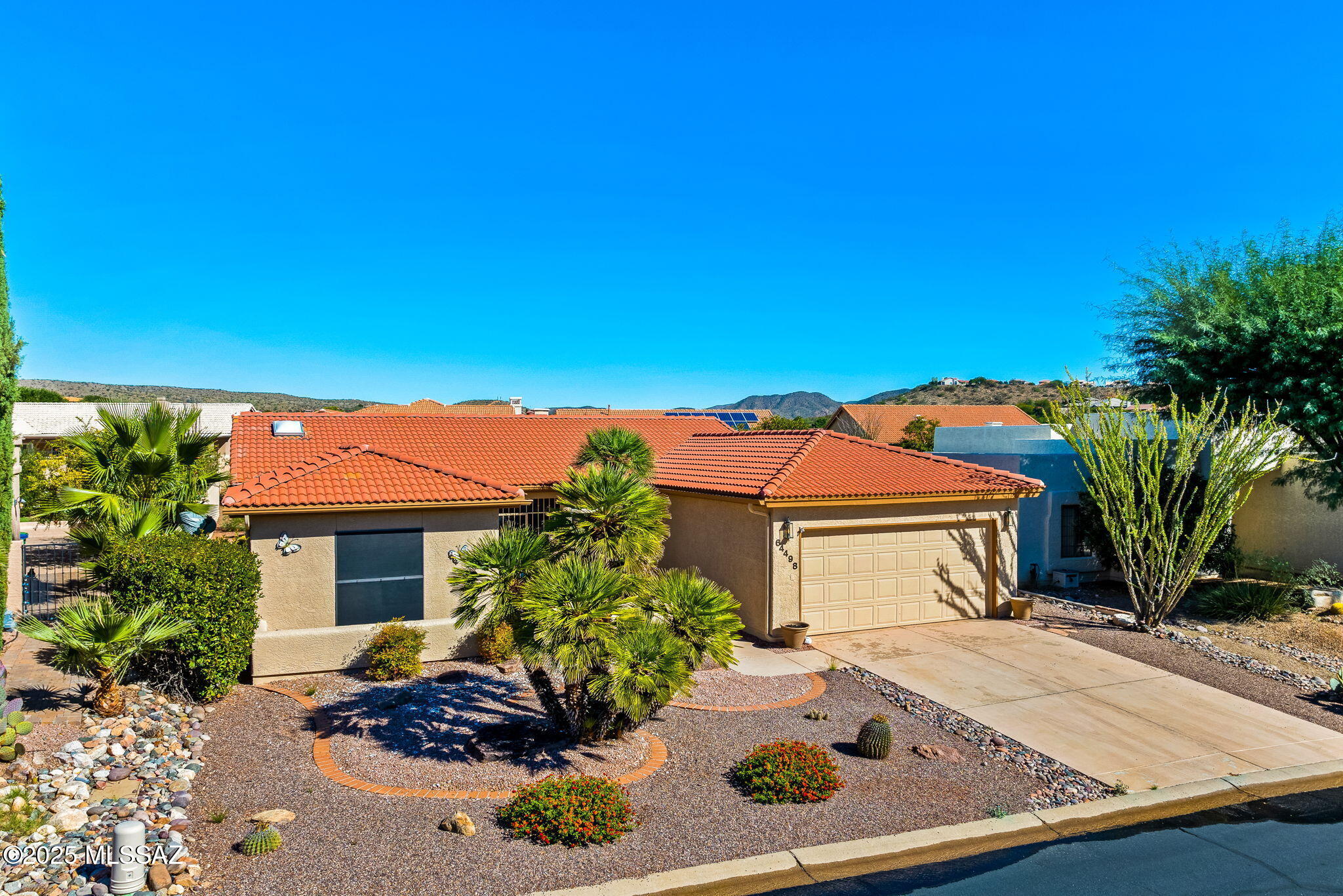 Enjoy the convenience and lifestyle offered by a ¼ mile walk to the amenities of Saddlebrooke One. With golf, racquet sports, swimming pools, fitness, dining and other amenities at your fingertips, it's easy to be out and about! This home offers residents a low maintenance full time experience or would work well for a lock and leave seasonal property. Greeted by a freshly painted exterior and entry courtyard, the home exudes charm. Inside, this 1,570 sq ft plan includes 2 bedrooms, 2 bathrooms and great flow. Remodeled in 2019, the home showcases newer flooring, updated systems (HVAC & water heater), a tiled shower, and a refreshed kitchen. The large ¼ acre lot offers excellent privacy and space for pets or future enhancements. In the Saddlebrooke community, residents enjoy a neighborhood robust with opportunities to live life to its fullest. The amenities include a large clubhouse with three restaurants, a private 27-hole golf facility, an award-winning tennis complex, a state-of-the-art fitness center with saunas and whirlpools, a beautiful swimming pool complex, and facilities to accommodate the activities of over 100 groups and clubs.  

A short 15-minute drive south, Oro Valley provides shopping, dining, a hospital, farmers market, library and many more conveniences.