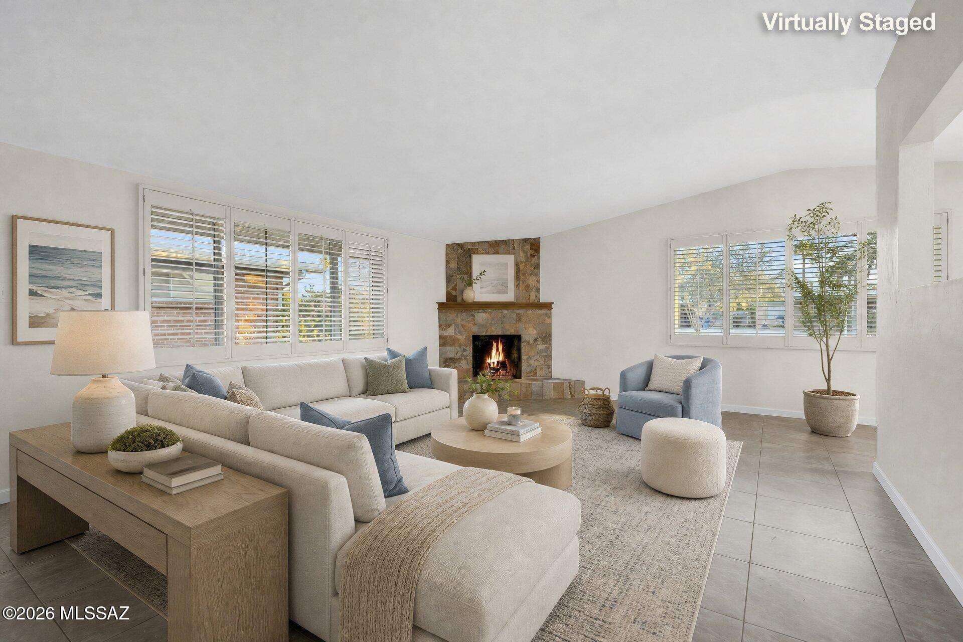 Exceptional value in today's market! Offering a rare combination of updates, location, and affordability, this move-in-ready home presents an opportunity buyers won't want to miss! NO HOA, a beautifully updated interior, and a spacious lot full of possibilities--this Central Tucson gem checks all the boxes! From the moment you arrive, you'll appreciate the perfect blend of modern updates and timeless charm. Step inside to discover a bright, welcoming interior filled with natural light thanks to newer windows that showcase the home's thoughtful upgrades and elegant plantation shutters. The remodeled kitchen serves as the heart of the home, offering a stylish and functional space for cooking, gathering, and everyday living. Updated flooring flows throughout the home, while new carpet in the the inviting living area is anchored by a cozy fireplace, creating the perfect place to relax, entertain, or unwind after a long day. Outside, the oversized lot provides endless potential. Whether you're dreaming of a backyard oasis, garden retreat, outdoor entertaining space, or simply enjoying the freedom that comes with extra room to spread out, this property offers a rare opportunity to make it your own. Additional peace of mind comes from a brand-new HVAC system installed in 2026, allowing you to enjoy Tucson summers with confidence. Conveniently located in the heart of Central Tucson, you're just minutes from Downtown Tucson, the University of Arizona, shopping, dining, biking paths, entertainment, and everything that makes Tucson such a desirable place to call home. Updated, move-in ready, and ideally located--this is the one you've been waiting for.