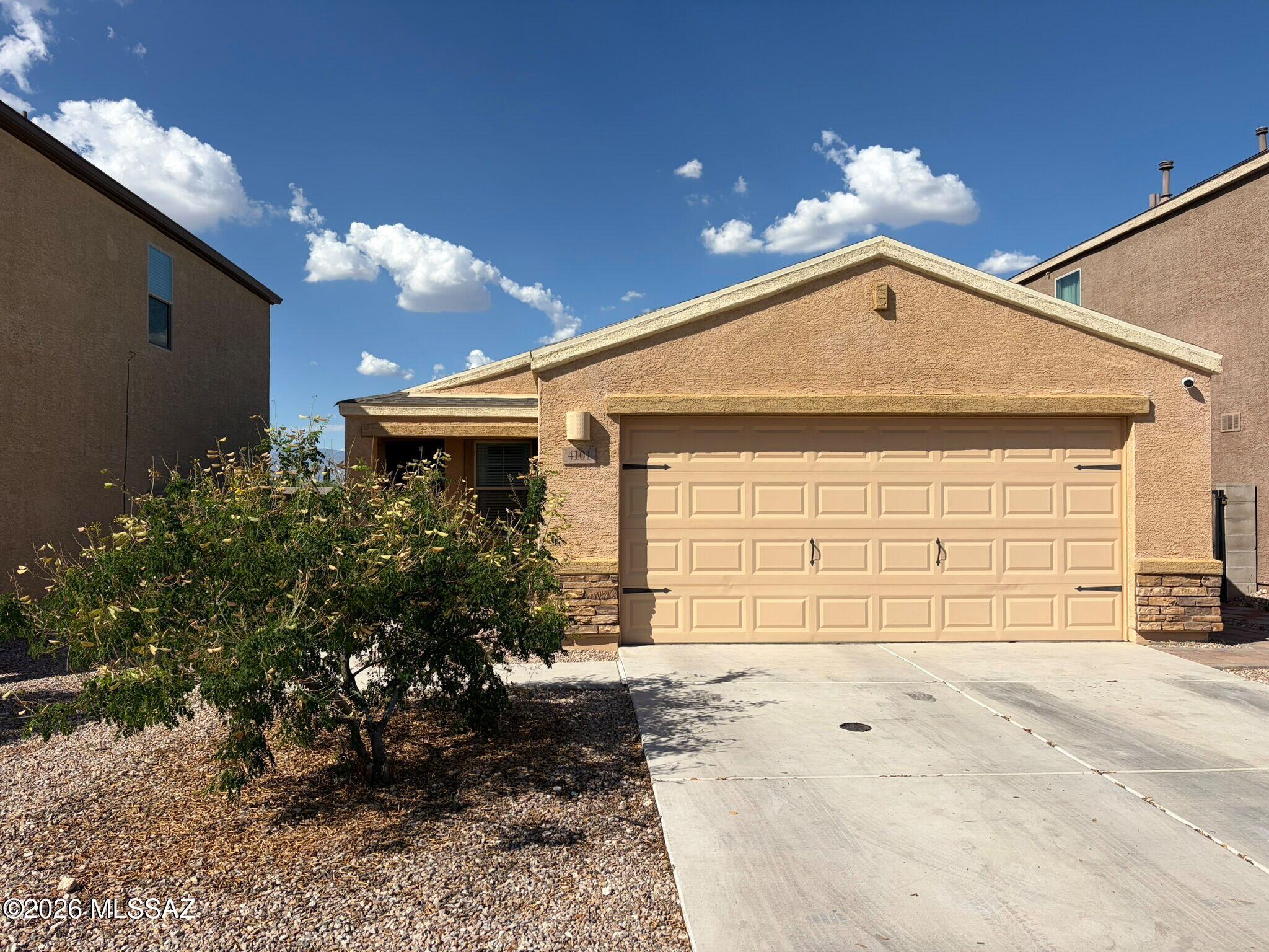 No Application Fees! Single level 3-bedroom, 2-bathroom Tucson home located in the desirable Cantera community. This well-maintained home features tile and laminate flooring throughout with no carpeting, neutral paint throughout, upgraded 2-inch faux wood window blinds, ceiling fans throughout, and abundant natural lighting. The spacious floor plan includes a large open living room and separate dining area, creating excellent space for everyday living and entertaining. The beautifully upgraded kitchen features granite countertops and backsplash, upgraded cabinets with crown molding, separate pantry, breakfast bar, direct patio access, stainless steel appliances, and ample cabinet and counter space. The oversized primary suite includes a walk-in closet and spacious private bathroom with large vanity and step-in shower. Two additional bedrooms provide flexibility for guests, office space, or hobbies. Washing machine and dryer are included for convenience. The attached two-car garage offers ample parking and storage space. The backyard features a covered patio, extended patio area, synthetic grass, easy-to-maintain desert landscaping, and added privacy with no rear neighbors.

Conveniently located near shopping, restaurants, schools, parks, Tucson International Airport, and major employment centers. Easy access to I-10, Downtown Tucson, the University of Arizona, and numerous recreational and entertainment destinations throughout the Tucson area.

All Denali Real Estate residents are automatically enrolled in the Resident Benefits Package (RBP) for $55.00/month which includes Renter's Liability Insurance, Credit Building to help boost the resident's credit scores with timely rent payments, up to $1M Identity Theft Protection, HVAC air filter delivery (for applicable properties), our best-in-class resident rewards program, and much more!