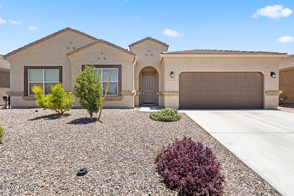 Better than new & surrounded by breathtaking desert scenery, this beautifully maintained Citrine floor plan in Saguaro Bloom offers the effortless Arizona lifestyle buyers dream about! With 4 bedrooms, 3 full bathrooms, & a dedicated study that could easily serve as a 5th bedroom, this home was designed with flexibility in mind. An impressive kitchen featuring a HUGE island with breakfast bar, opening to the spacious living & dining area. The large sliding doors showcase mountain views & stunning natural desert scenery with saguaros visible from the kitchen, great room, primary suite,& backyard. Residents enjoy the community amenities including two pools, a splash pad, fitness center, clubhouse, basketball court, numerous parks,& walking paths. Assumable VA loan for qualified VA buyers. This like-new home offers the beauty of the Sonoran Desert, near shopping & restaurants.