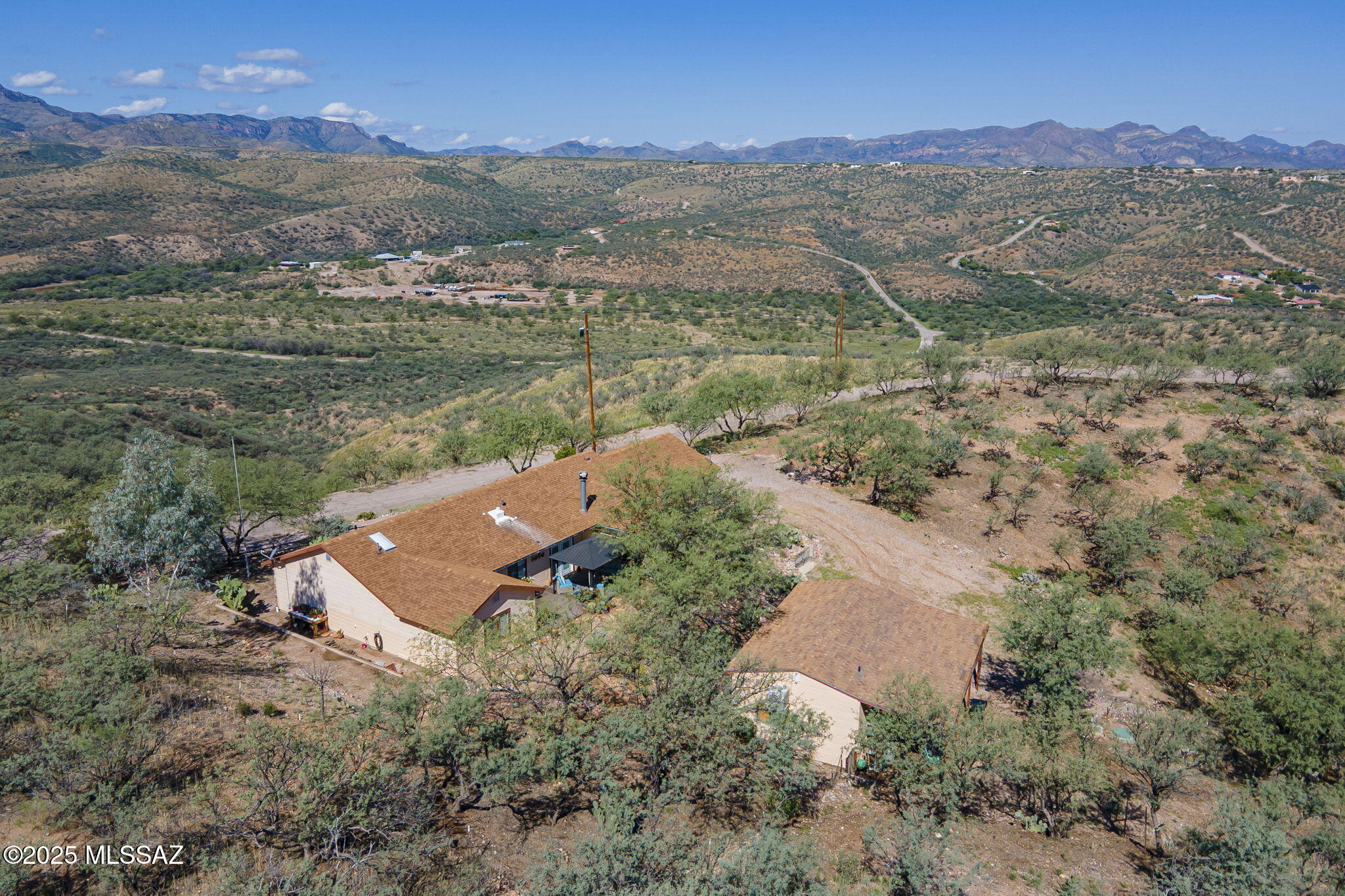 Seller is offer $5000.00 toward closing costs with an acceptable offer.  Come see everything this amazing property has to offer. 

This beautifully maintained home sits on 4.53 acres with breathtaking mountain views from every window, the patio deck, and front porch. Featuring 4 spacious bedrooms, 2 full bathrooms and 1 half bath in the home, property has a detached workshop with office, storage, and an additional half bath, this property offers space, flexibility, and endless possibilities.
Bring your RV, there is covered parking and a full hook-up, it's ready for your next adventure. Whether you're enjoying the peaceful scenery, entertaining on the deck, or working from the comfort of your private workshop,