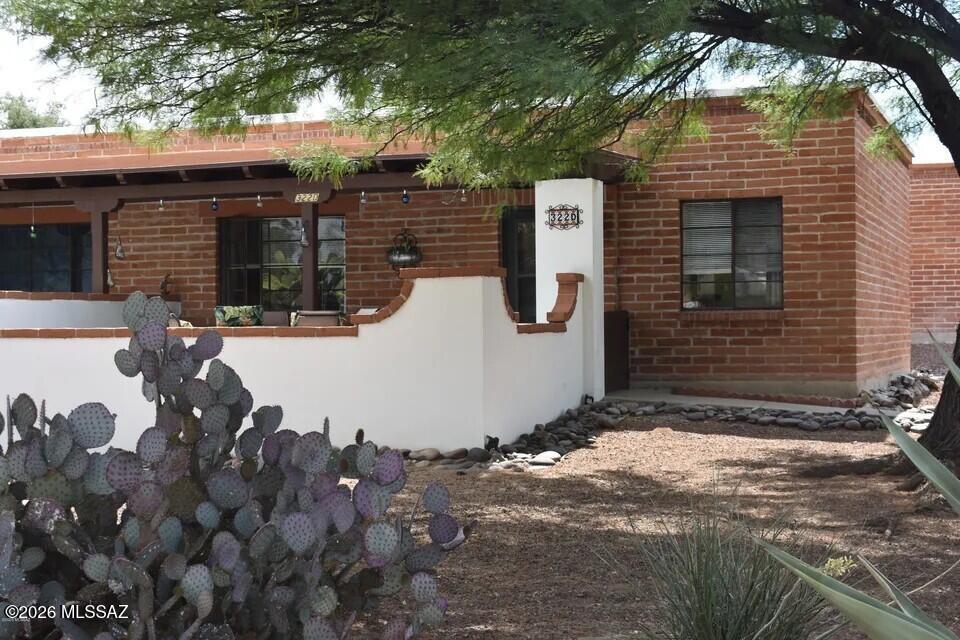 **Villas West** Active adult (55+) community with GVR membership included. This charming 2-bedroom, 1-bath home features an updated open kitchen and attractive tile-look vinyl flooring throughout. The bath tub has been modified for senior safety..
 Enjoy breathtaking sunrises from the large patio & wake up to beautiful sunrise from the primary bedroom, which opens to the patio area. The assigned parking space is conveniently located right in front of the unit, allowing easy access from your car to the gate. Residents have access to four community pools and shared laundry facilities. Water, sewer, and trash services are included and paid by the HOA.  The home is attached  only on one side,  Close to shopping & all conveniences.  Furniture will be removed prior to occupancy.