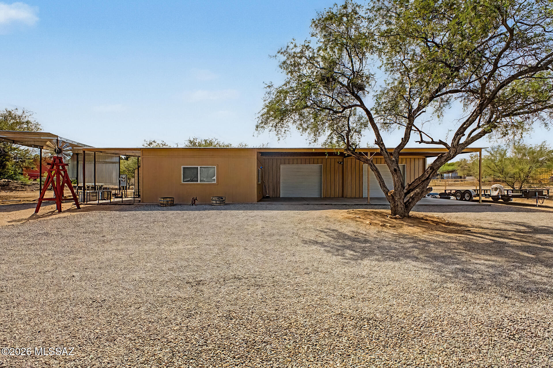 Nestled on 1.45 acres with stunning mountain views, this horse property features a 4-bedroom, 2-bath main home, a detached 1-bedroom, 1-bath guest house, a sparkling built-in pool, and a large garage. Enjoy the perfect combination of privacy, space, and versatility with room for horses, hobbies, and outdoor living.