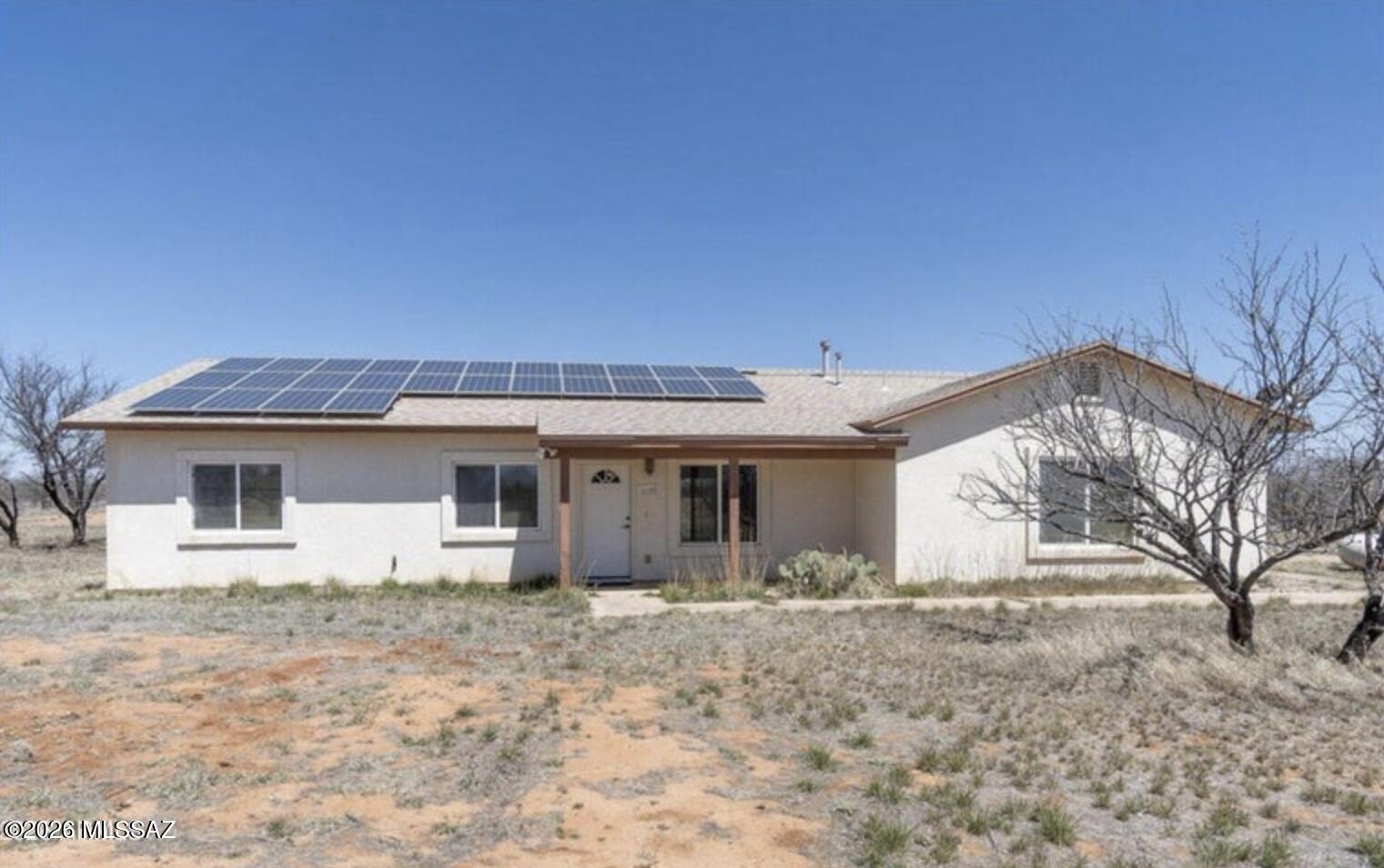 Range priced at $269,000-$279,000. Seller is motivated and willing to consider reasonable offers, including potential buyer credits/concessions.
This 4-bedroom, 2-bath home offers an open-concept layout with split-bedroom design for added privacy. The kitchen features generous cabinet storage, a center island with bar seating, and a gas cooktop. The primary suite includes a walk-in closet, and the attached 2-car garage offers laundry hookups.
Situated on 4 acres with mountain views, the property includes a prepaid solar lease through 2031, providing added utility savings. Roof replaced approximately 1 year ago. Property is served by private well and septic system.
