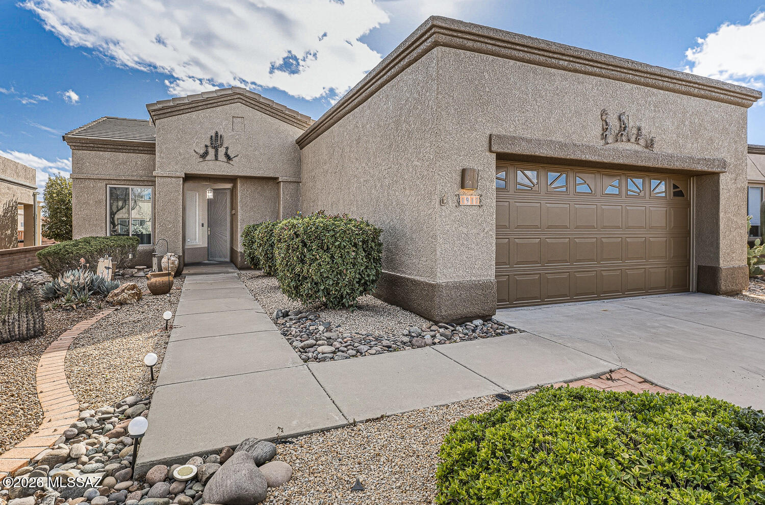 MOTIVATED SELLER! PRICE REDUCED TO JUST $319,000! This is your chance to own a spacious, well-updated home at an exceptional price. While it needs a few surface touch-ups, several major updates have been done, making this an incredible value. Offering 1,684 sq. ft., the home features 2 bedrooms, 2 baths, plus a den/office with a built-in Murphy bed for flexible guest space. The bright great room is filled with natural light, and recent updates include new tile flooring, quartz kitchen countertops, newer appliances, fresh exterior paint, new windows, and a new sliding glass door. The kitchen has 3 pantries for exceptional storage. Enjoy the covered patio with electric shades and partial mountain views.Conveniently located near golf, shopping, and dining.Don't miss this opportunity!