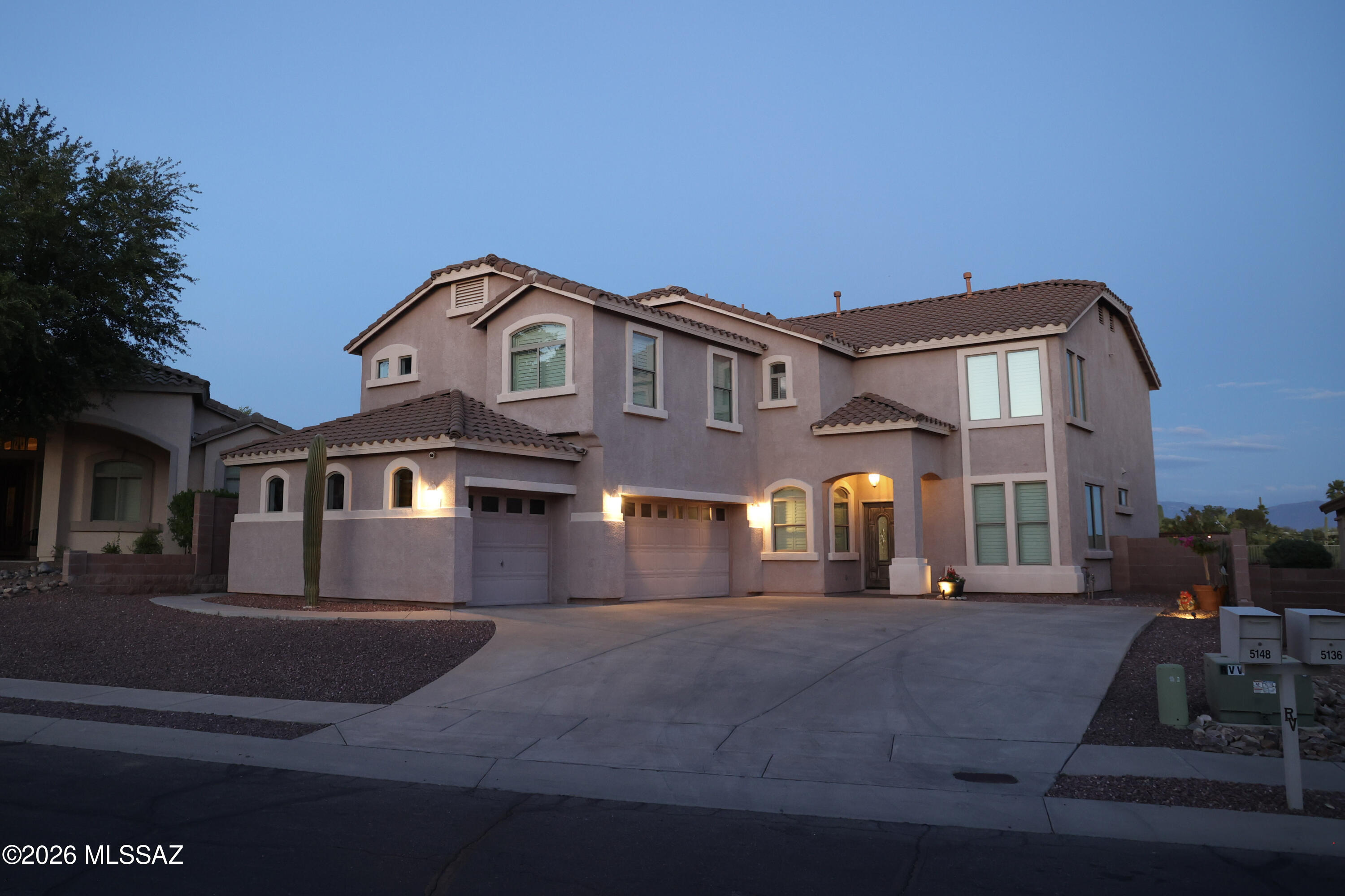 Located within the exclusive River View Estates gated community, this move-in ready home offers sweeping mountain views and a resort-style backyard featuring: a 40,000+ gallon Pebble Tec pool, 9.5' deep end, waterfall, raised stage, outdoor BBQ, sink, fridge, surf shower, bar seating, and covered patio. New American Std HVACs, windows, water heater, and smart home Ecobee thermostats, Z-wave lights, MyQ garage openers, and B-hyve irrigation. Large windows and 22' ceilings elevate the great room, complemented by a chef's kitchen and formal dining. 5BR/3BA layout w 3 car garage includes a ground-floor bedroom and full bath. Primary suite w soaking tub & glass shower. Acacia flooring, plantation shutters, fans, surround sound, recessed lighting, dog door and more make this home a must see!