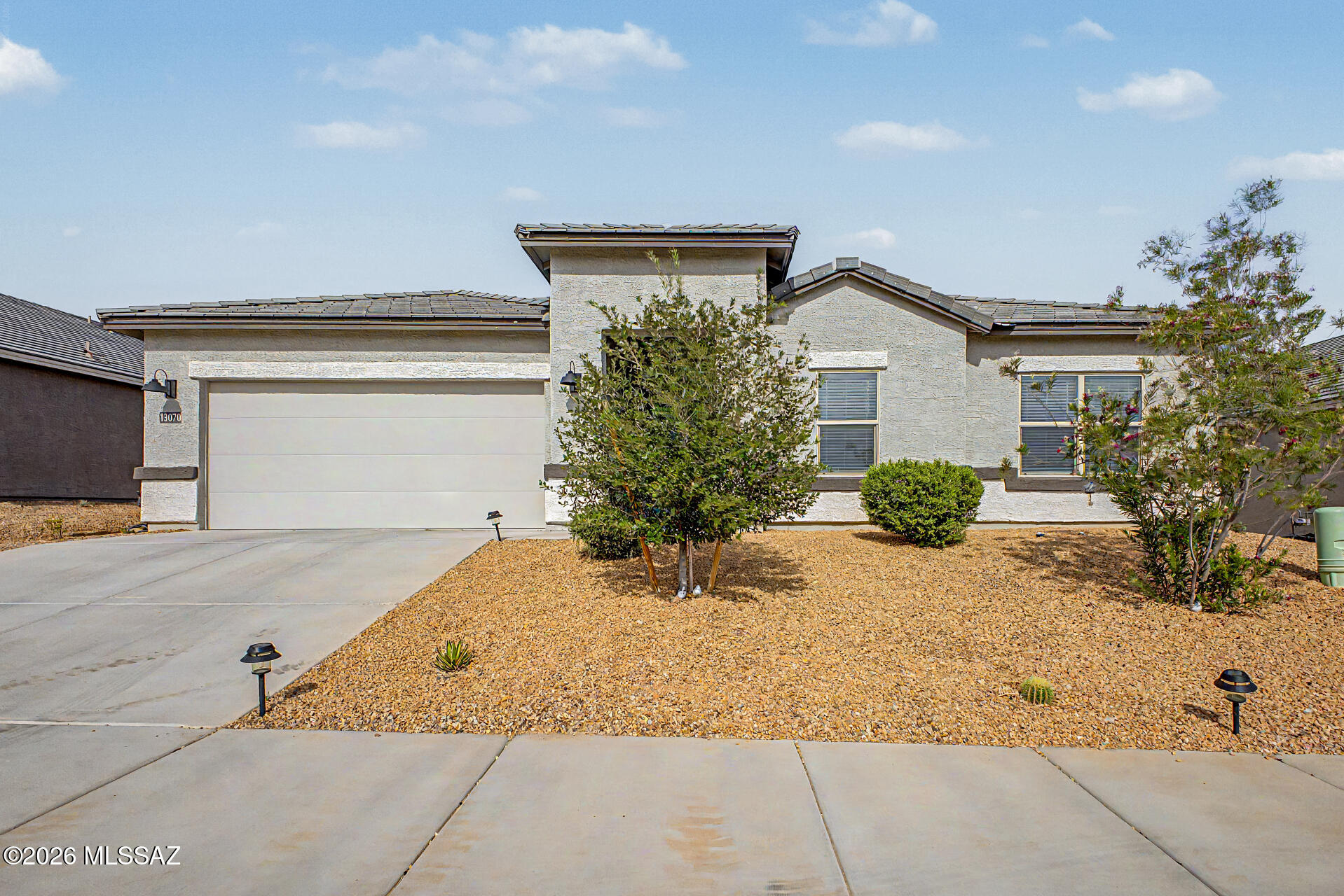 The search is finally over! Welcome to this delightful 5-bedroom residence showcasing a spacious great room with high ceilings, a soothing palette, recessed lighting, blinds, and attractive wood-look flooring. The gourmet kitchen comes with sleek quartz counters, ample grey cabinetry with crown moulding, stainless steel appliances, a walk-in pantry, and an island with a breakfast bar for casual dining. The cozy primary bedroom showcases soft carpeting, an ensuite with double sinks, and a convenient walk-in closet. Spend quiet afternoons in the lovely backyard, complete with a covered patio and breathtaking mountain views for a picturesque backdrop. The Community offers a fun playground and well-maintained common areas. Don't miss out on this fantastic opportunity!