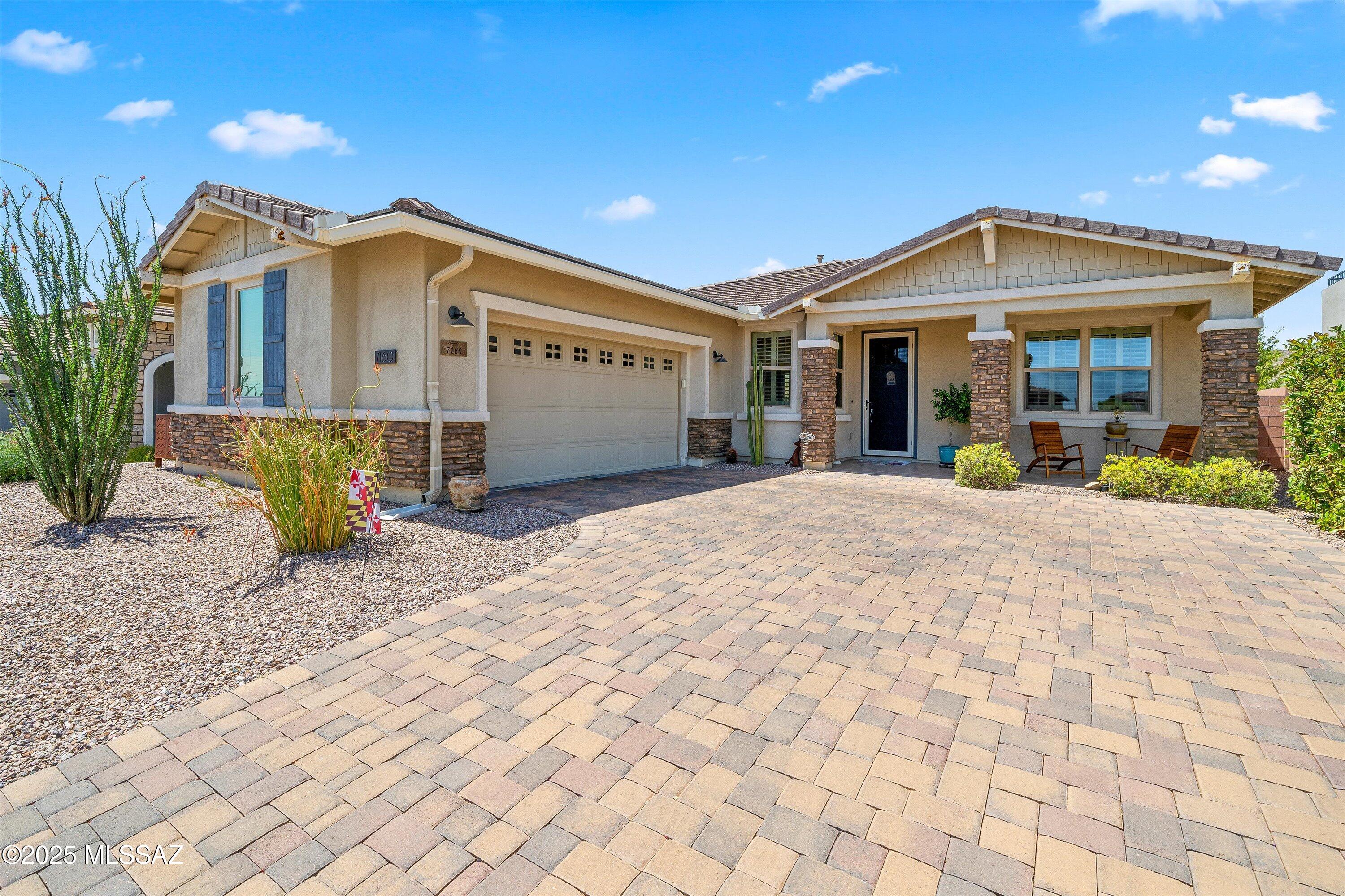 VA assumable loan available 2.375%. Welcome to your desert oasis, this Peralta floor plan with custom upgrades offers 2 BD/2BA (1,896 sq ft)+den located in a gated enclave nestled on a premium cul-de-sac lot. The open great room features a cozy fireplace and flows seamlessly into the upgraded kitchen, complete with modern finishes. The owner's suite is a true retreat, offering private patio access, dual walk-in closets, a luxurious soaking tub and large walk-in shower. Step outside to enjoy the covered patio with remote-control shades, extended pavers, low-maintenance turf, and breathtaking views- perfect for relaxing or entertaining year-round. This home offers an ideal combination of comfort, privacy and upscale living-all within minutes of world-class golf, hiking, biking and more!