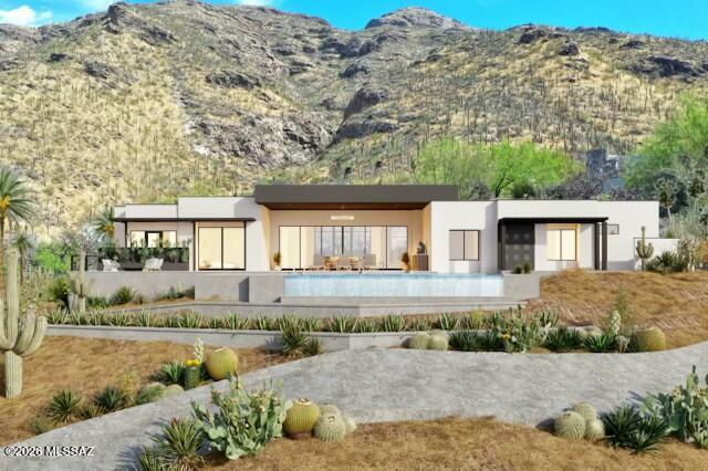 Experience elevated desert living in the exclusive 24/7 guard-gated community of Sin Vacas. This exceptional new construction opportunity offers 4 bedrooms, 4 bathrooms, and breathtaking 180° city views paired with unobstructed Catalina Foothills mountain vistas from its premier elevated homesite. Thoughtfully designed by renowned architect Greg Simmons, the residence blends striking contemporary architecture with seamless indoor-outdoor living, capturing the beauty of the surrounding landscape from every angle. Expansive walls of glass, sophisticated finishes, and a carefully curated floor plan create an atmosphere of refined luxury and effortless comfort. The elevated setting provides unmatched privacy while showcasing dramatic sunsets, sparkling city lights, and panoramic mountain scenery.This is a rare opportunity to own a meticulously crafted modern retreat in one of Southern Arizona's most coveted gated communities.

Lot & Plans only, Builder consultations available.