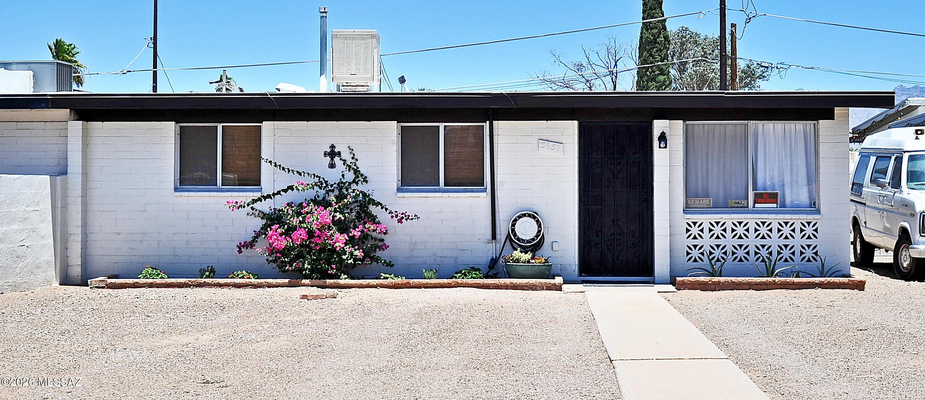 Enjoy comfortable living in the heart of Central Tucson in this beautifully updated 3 bedroom, 2 bathroom home. Featuring an updated kitchen and remodeled bathrooms, tile flooring throughout the main living areas, and carpet in the bedrooms, this home is truly move-in ready.
Step outside to a covered back patio overlooking a generously sized backyard with double gates and a concrete pad, perfect for extra parking, RV storage, trailers, or your favorite outdoor toys.
Conveniently located just minutes from Davis-Monthan Air Force Base, Reid Park, shopping, dining, and everyday conveniences. You'll also love the nearby neighborhood urban farm and community center, offering a unique gathering place for events, activities, and a strong sense of community.