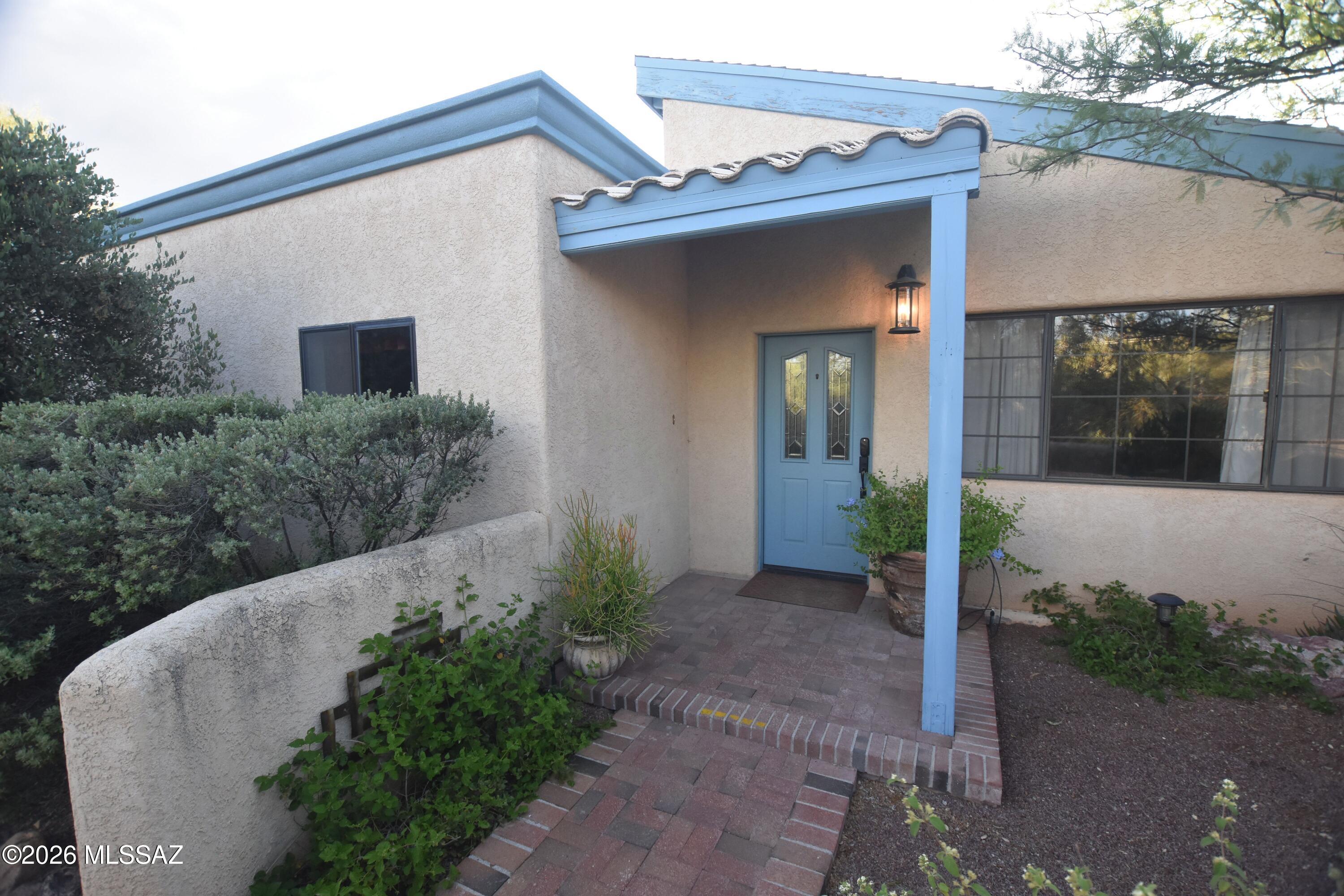 No Application Fees! Single level 3-bedroom, 2-bathroom Tucson home situated on a quiet lot in a desirable west Tucson location. Conveniently located near Tucson Mountain Park and Saguaro National Park West, this home offers easy access to some of the area's best outdoor recreation and desert scenery. Interior features include tile flooring throughout all living and high traffic areas with neutral carpeting in the bedrooms, vaulted ceilings, ceiling fans throughout, neutral paint, and abundant natural lighting. The spacious living room features vaulted ceilings, a beautiful gas fireplace with stone surround, and large windows that enhance the open feel of the home. The kitchen offers tile countertops, a separate dining area, ample cabinet space, all appliances, and a separate wine refrigerator. The oversized primary suite includes a built-in gas fireplace, private bathroom, and generous closet space. Washing machine and dryer are included for convenience. The backyard features a covered patio, easy-to-maintain desert landscaping, and a peaceful setting perfect for enjoying Arizona evenings. With no HOA, this property offers additional flexibility and privacy.

Enjoy a convenient west Tucson location near hiking, biking, horseback riding, and outdoor recreation at Tucson Mountain Park and Saguaro National Park West. Close to shopping, restaurants, schools, and major Tucson employment centers while offering a quiet residential setting surrounded by natural desert beauty.

All Denali Real Estate residents are automatically enrolled in the Resident Benefits Package (RBP) for $55.00/month which includes Renter's Liability Insurance, Credit Building to help boost the resident's credit scores with timely rent payments, up to $1M Identity Theft Protection, HVAC air filter delivery (for applicable properties), our best-in-class resident rewards program, and much more!