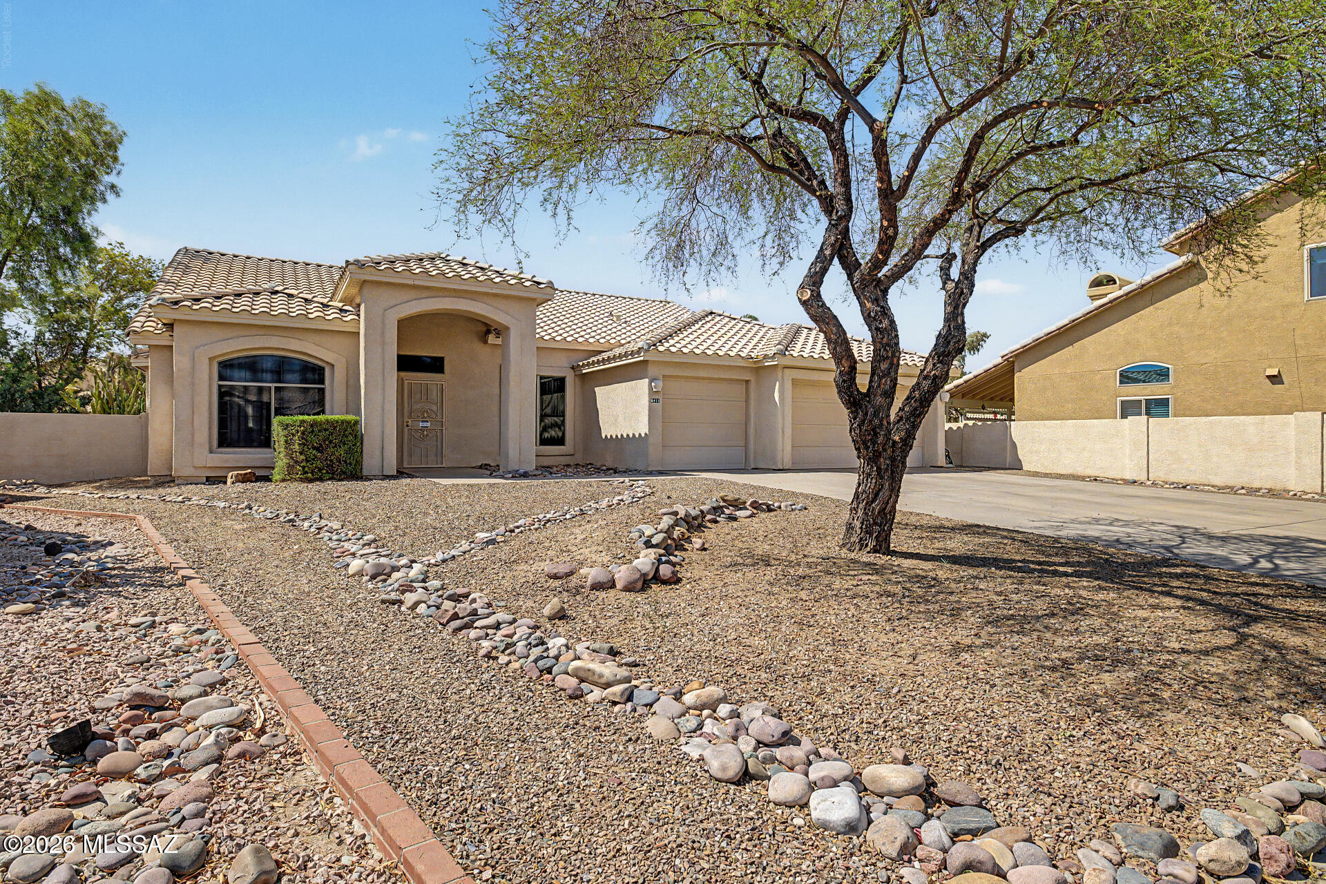 Tucked away on a quiet cul-de-sac in Continental Ranch, this beautifully maintained 4-bedroom, 2-bath home sits on an oversized 0.27-acre lot with a backyard that's increasingly hard to find. Mature landscaping, striking organ pipe cactus, a sparkling pool, and Sombrero Peak mountain views create an exceptional outdoor retreat.

Inside, 2,183 square feet features vaulted ceilings, an open floor plan, and abundant natural light. The spacious kitchen offers a large island, newer stainless steel appliances, and generous prep space, flowing seamlessly into the great room with a cozy gas fireplace. A 3-car garage provides exceptional storage, while major updates--including a new HVAC system, full PEX repipe, and recent pool resurfacing, recoating, and new tile--offer peace of mind. Lovingly maintained by the same owners for nearly 25 years.

Just minutes from shopping, dining, I-10, river park trails, and located within the highly rated Marana Unified School District, this home combines privacy, convenience, and unforgettable mountain views in one of Northwest Tucson's most desirable neighborhoods.