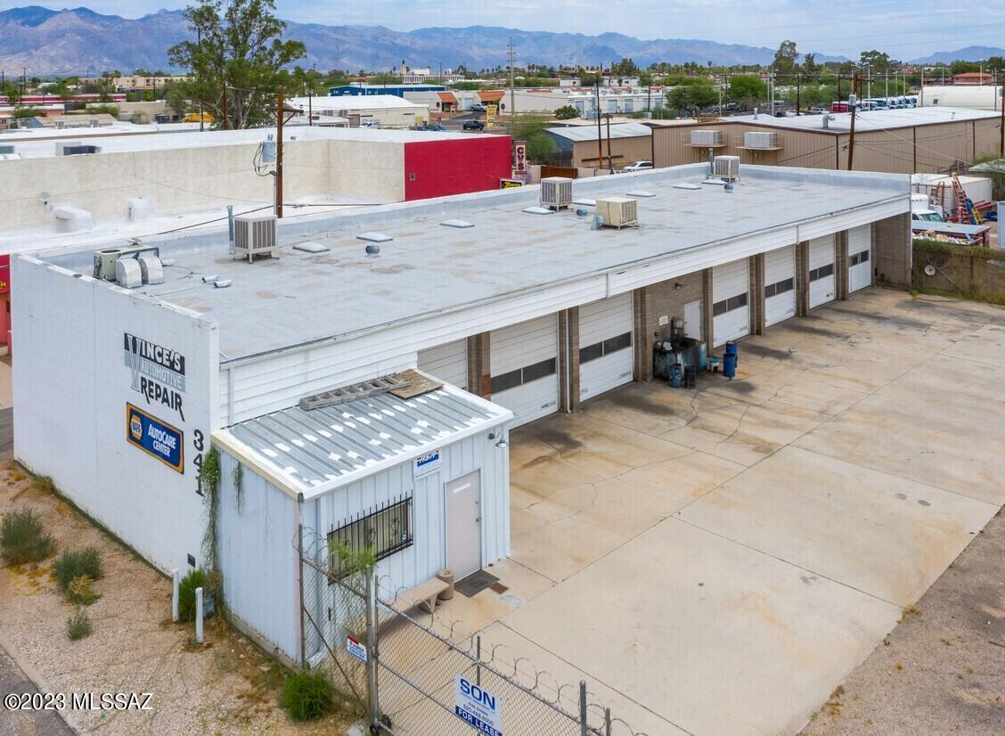 Existing auto repair shop, zoned I-1 for many uses. The 470 SF office has  A/C and restroom. Shop area has an additional restroom, 7 roll-up grade doors, 3 above ground lifts, and evaporative coolers. Large .35 acre yard is fully fenced, 6' fence plus razor wire, with 2 rolling gates. 
$10.00/SF Modified Gross lease.