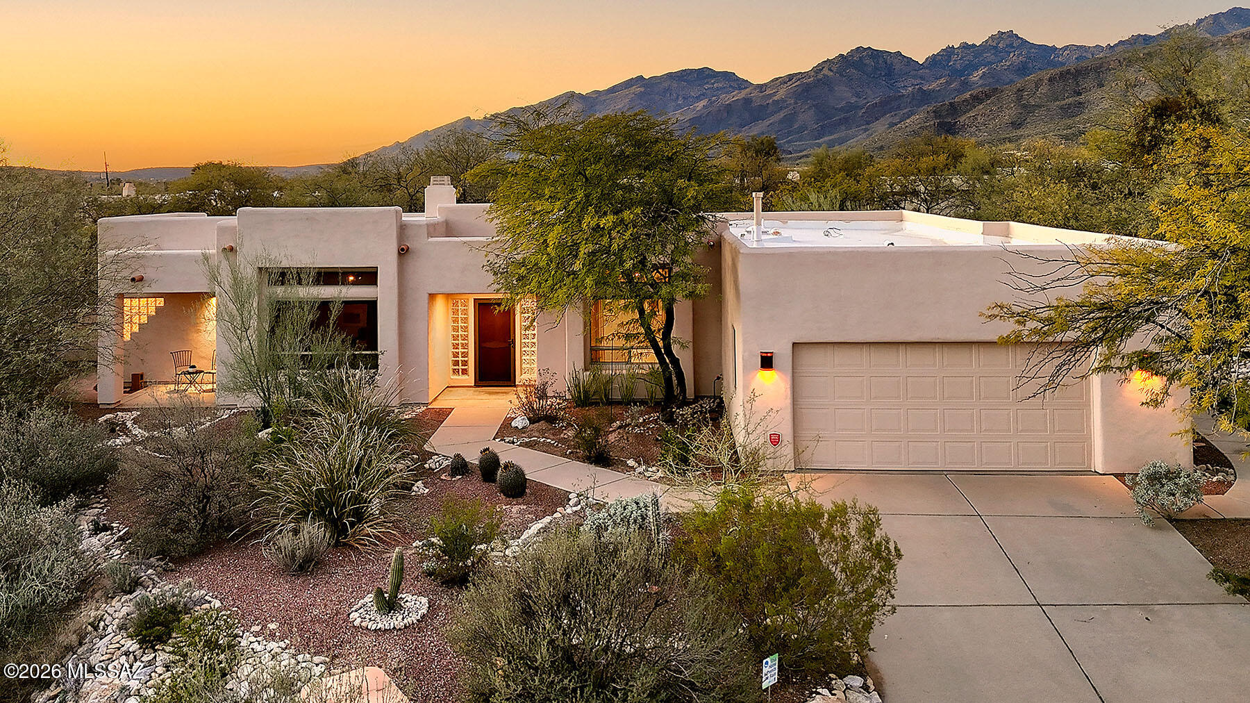 Range Priced. Seller will accept or counter offers between $700k-$725k. Well-maintained 3-bedroom, 2-bath home in Tanque Verde Valley. 2,343 sq. ft. of open living space on .56-acre lot at the end of a quiet cul-de-sac. Interior features include high ceilings, abundant natural light, skylights, & gas fireplace. Kitchen has Corian counters, stainless-steel appliances, natural gas range, breakfast bar, & pantry closet. Split bedroom plan highlights a spacious primary suite w/walk-in closet, two vanities, corner jet tub, & tiled walk-in shower. Outdoors, enjoy Catalina & Rincon Mountain views, covered patio, flagstone pathways, native desert landscaping w/ passive rainwater harvesting, & irrigated vegetable garden. Near Coronado National Forest, AZ National Golf Course, & McDonald Park. THE PROPERTY
> .56 Acre Parcel at the End of a Quiet Cul-De-Sac 
> Desirable Tanque Verde Valley Location
> Small Enclave of Homes 
> Spectacular Catalina and Rincon Mountain Views
> Minutes from Coronado National Forest with Year-Round Outdoor Recreational Opportunities
> Near Arizona National Golf Course and McDonald Park
> North-Facing Enclosed Yard Backs to El Duro Wash and Natural Desert Area
> Garden has Flagstone Pathways that Wind Through Native Desert Landscaping with Mature Trees 
> Passive Rainwater Harvesting and Drip Irrigation
> 10' x 15' Irrigated Vegetable Garden
THE HOME 
> 2,343 Square Feet of Living Area
> 3 Bedrooms and 2 Bathrooms
> High Ceilings with Lots of Windows and Skylights
> Formal Living Room
> Family Room and Dining Area Off Kitchen
> Corner Natural Gas Fireplace in Family Room
> French Doors to Office/Den
> Corian Counters and Breakfast Bar in Kitchen
> Stainless-Steel Appliances
> Natural Gas Range
> Pantry Closet
> Split Bedroom Plan
> Spacious Primary Suite with Walk-in closet, Two Vanities, Corner Jet Tub Facing Glass Block Window, and Walk-in, Tiled Shower
> Extended Covered Patio 
> Spacious 2-Car Attached Garage with a Bank of Storage Cabinets and a Work Bench 
> Hunter-Douglas Window Shades
> Ethernet Computer Network Throughout and Wired for Security system