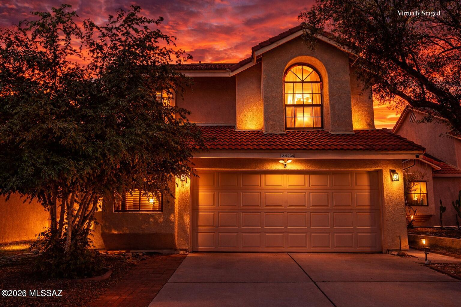 Welcome to this charming two-story home in the gated community of Countryside Valley! This well-maintained residence offers 3 bedrooms with a spacious loft, 2.5 bathrooms, and a 2-car garage, all surrounded by mature landscaping. Step inside to an inviting interior featuring designer paint, tile and wood-look flooring and soaring vaulted ceilings that enhance the home's bright and airy feel. The spacious living room is anchored by a cozy fireplace-perfect for relaxing or entertaining. The kitchen is thoughtfully designed with stainless steel appliances, granite tile countertops, a pantry, and ample espresso cabinetry for storage.